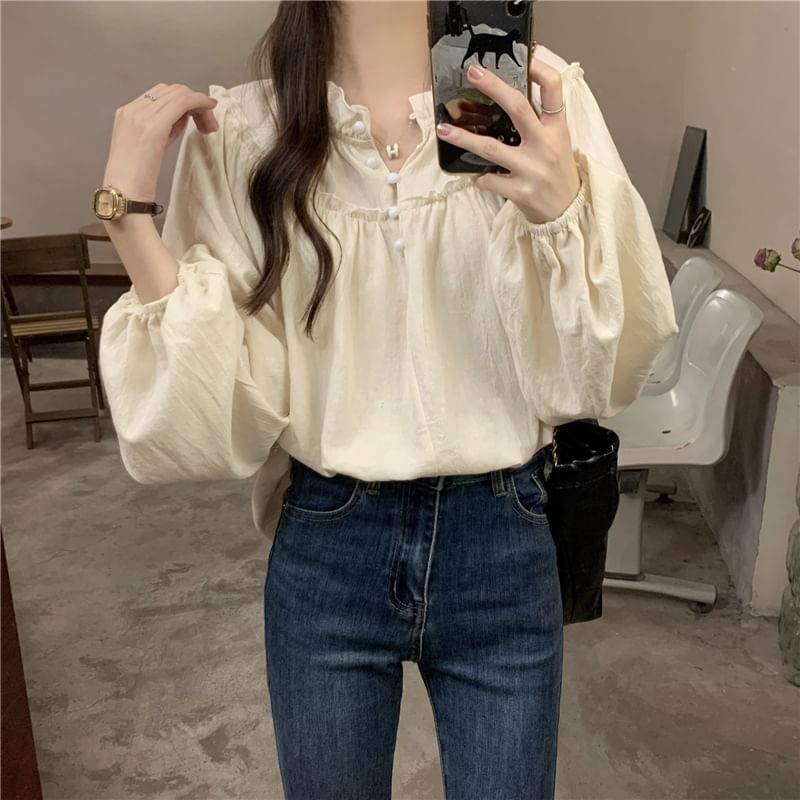 Sienne - Effen blouse met V-hals en ruches