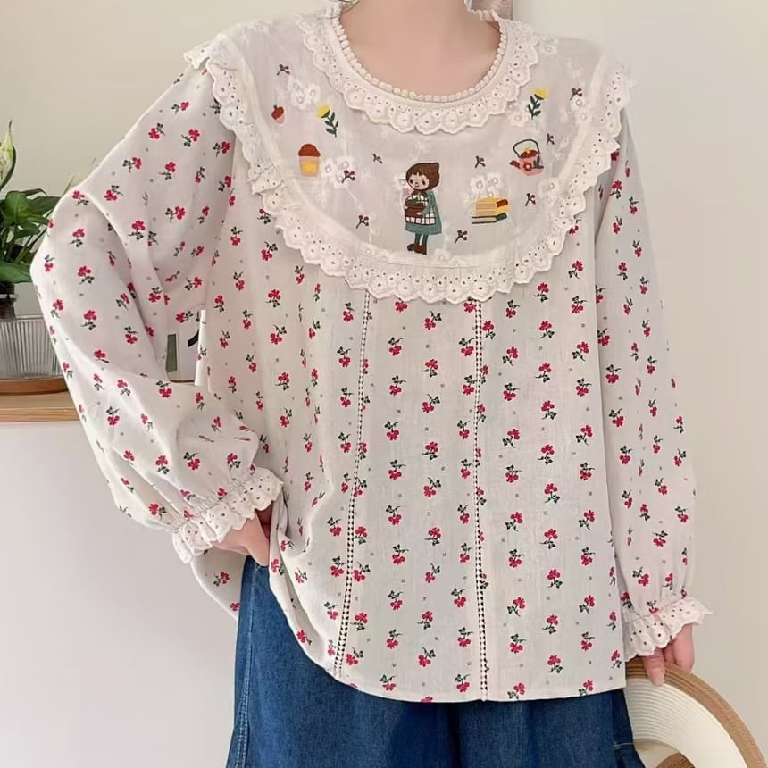 Aigan - Blouse met pofmouwen en bloemenkant