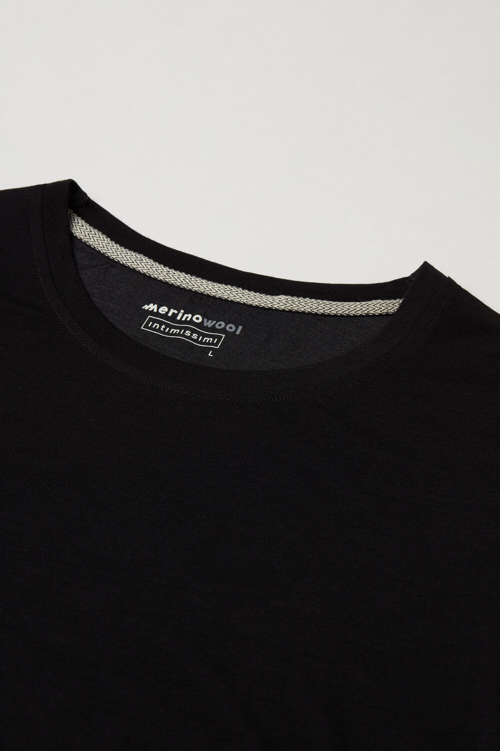 Blusa de lã merino de manga comprida e gola redonda