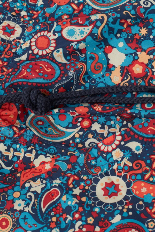 Maiô boxer de cashmere laranja com estampa.