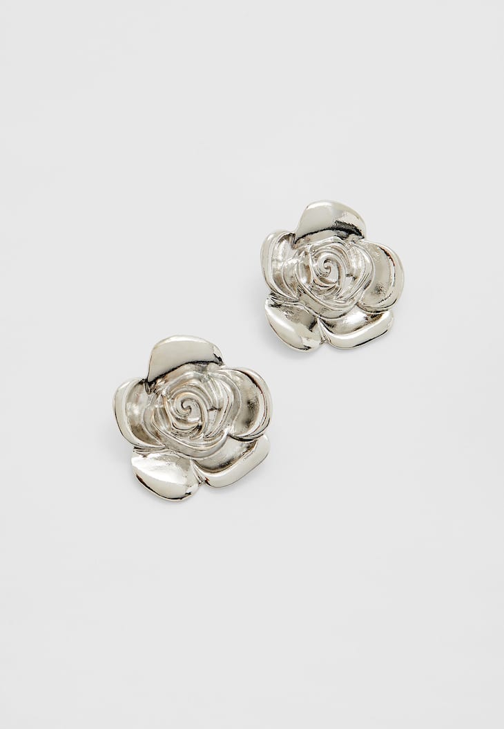Brincos de flor de metal