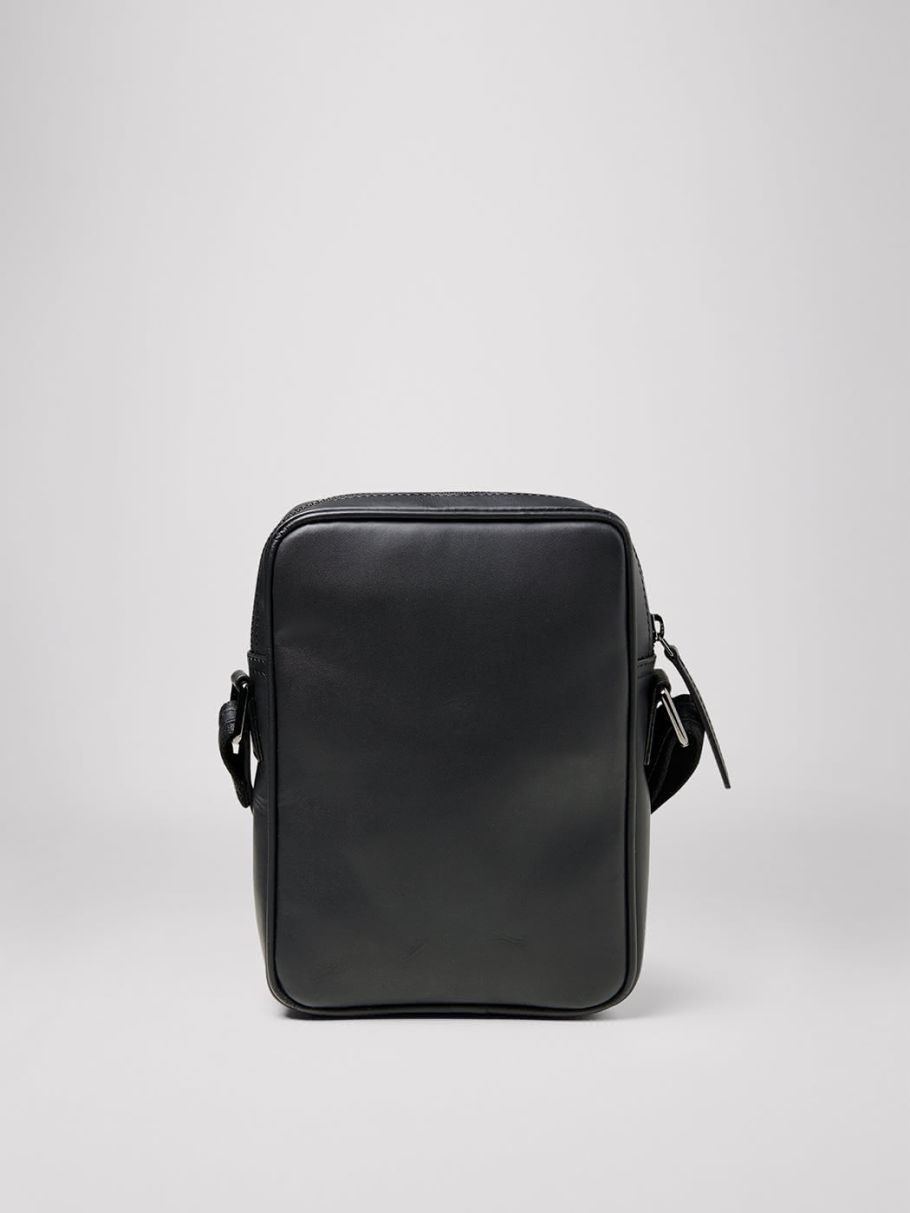 Petit sac bandoulière en cuir uni