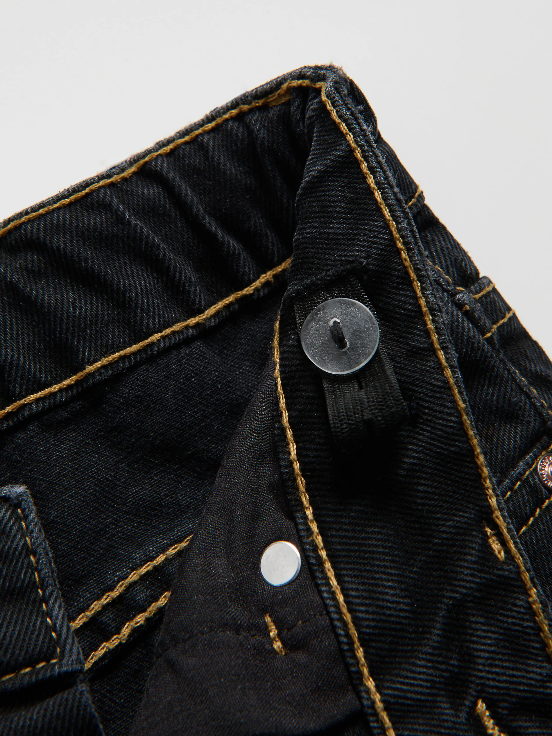 Gerade Jeans mit Schleifen