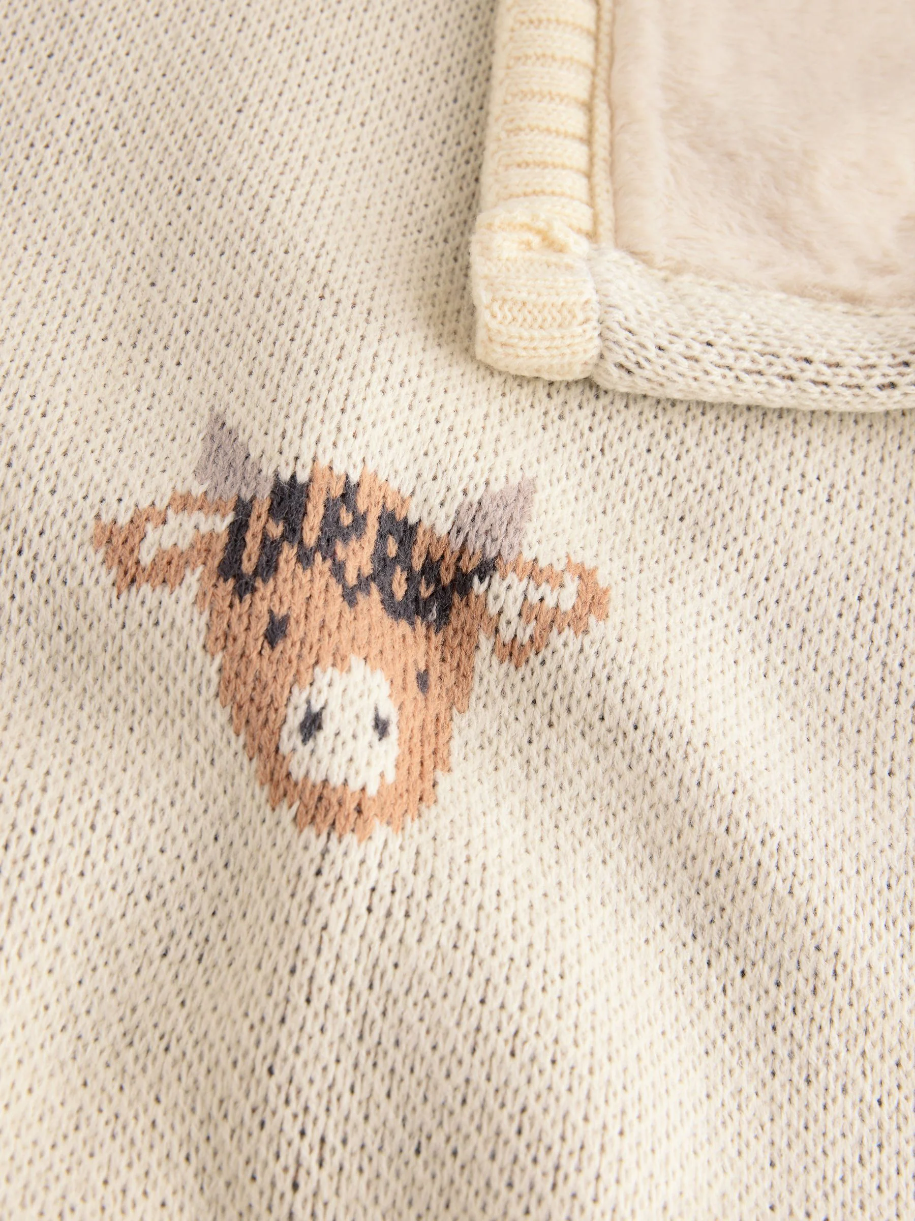 Gebreide babydeken met fleece voering