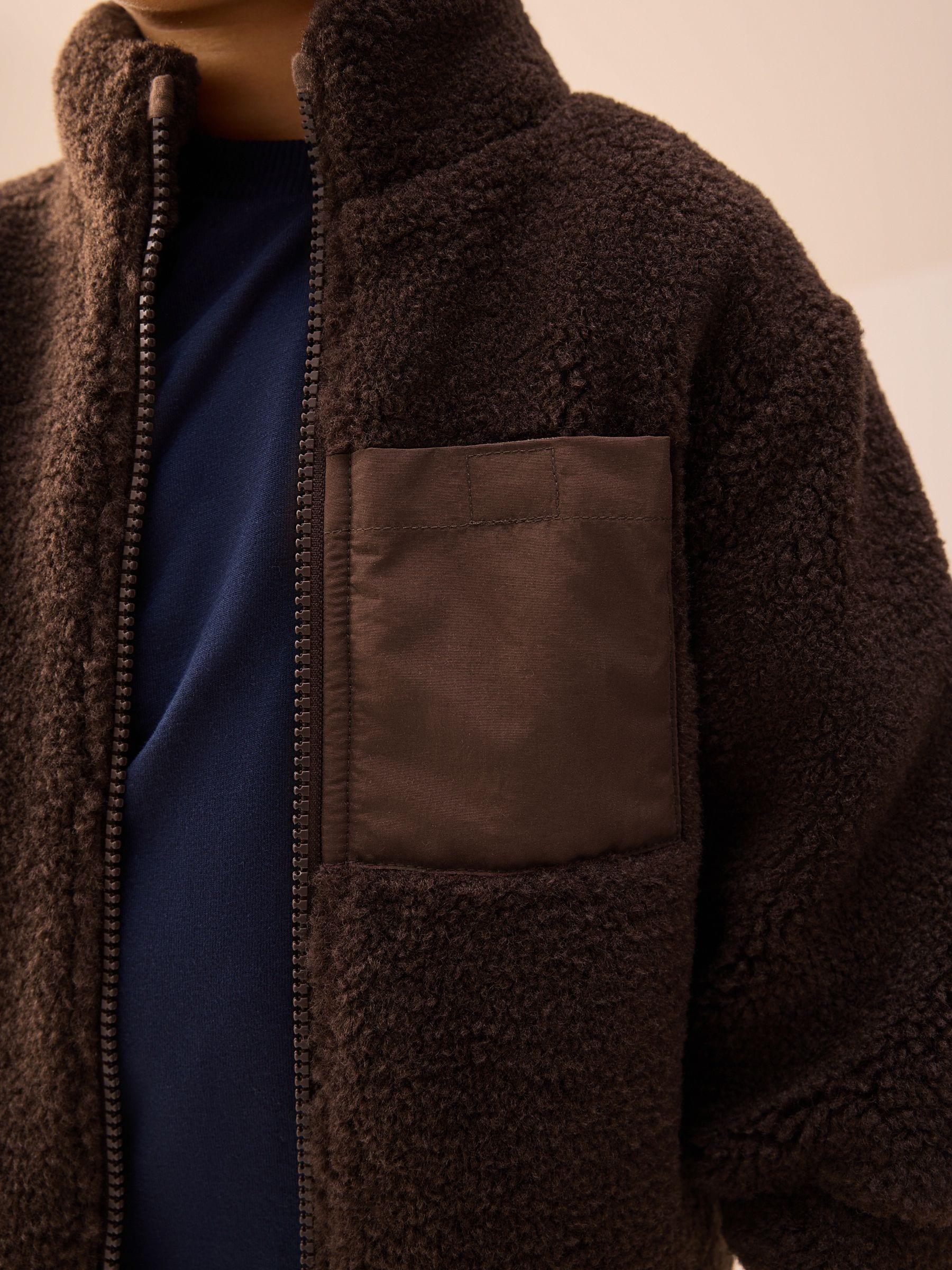 Chocoladebruin - Effen fleece met rits en trechterhals (3mnd-7jr)
