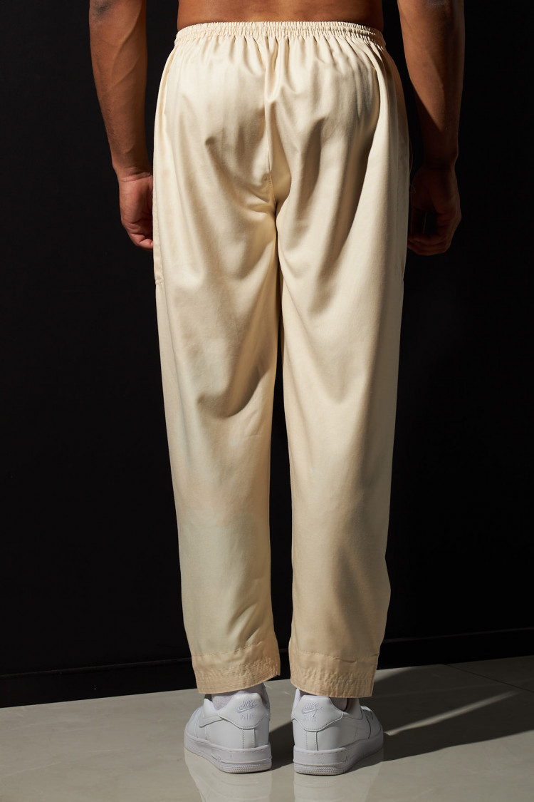 Ensemble 2 pièces qamis + pantalon beige