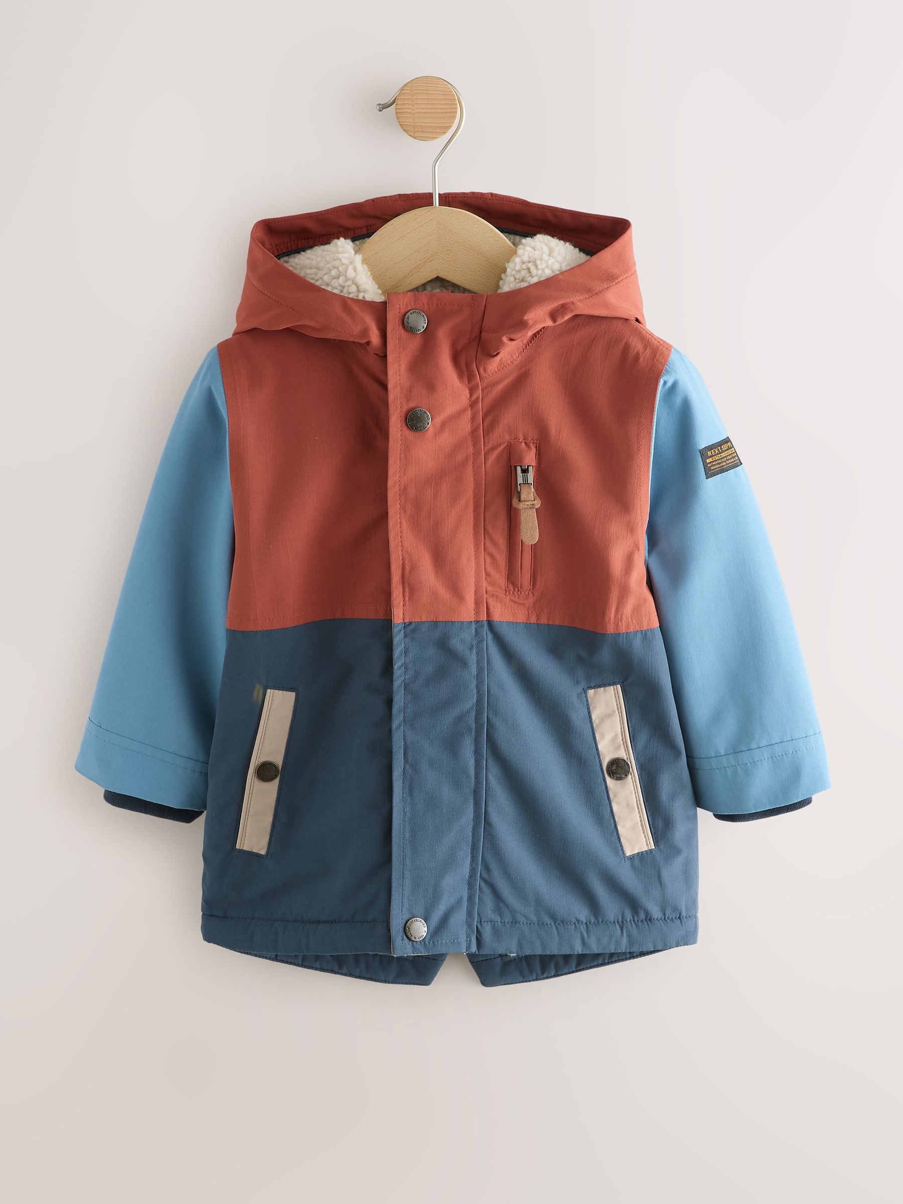 Marineblauw/rood met kleurvlakken - Waterdichte parka met borgvoering (3mnd -7jr)