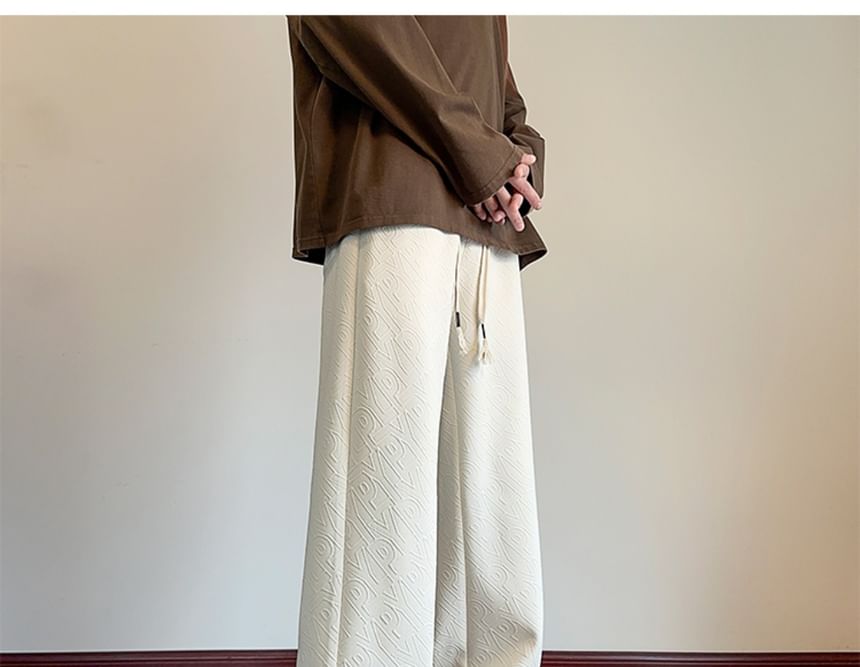 AXEN - Rechte broek met trekkoord in de taille, effen letters en reliëf