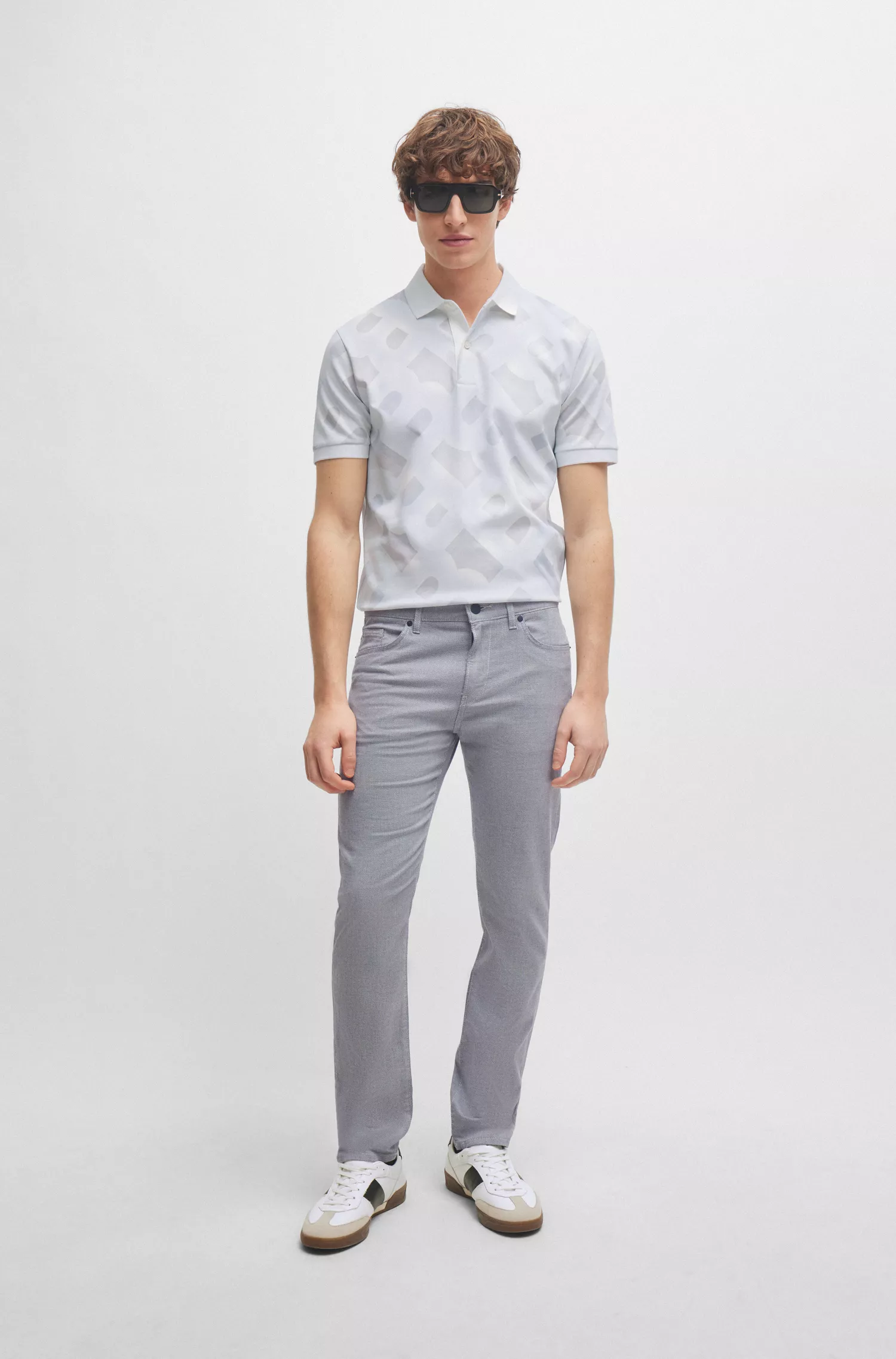 Calça jeans BOSS preta, corte slim, em denim stretch bicolor.