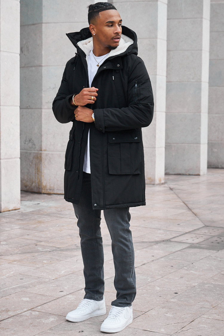 Parka noire à capuche longue à poches