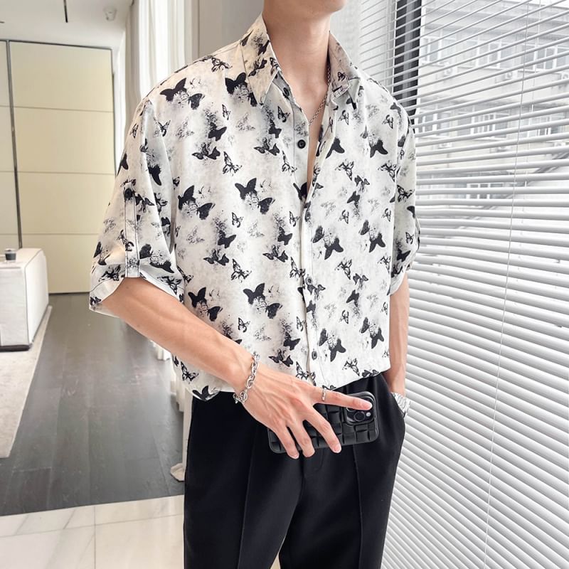 Orungeetun - Elleboogmouw vlinderprint shirt