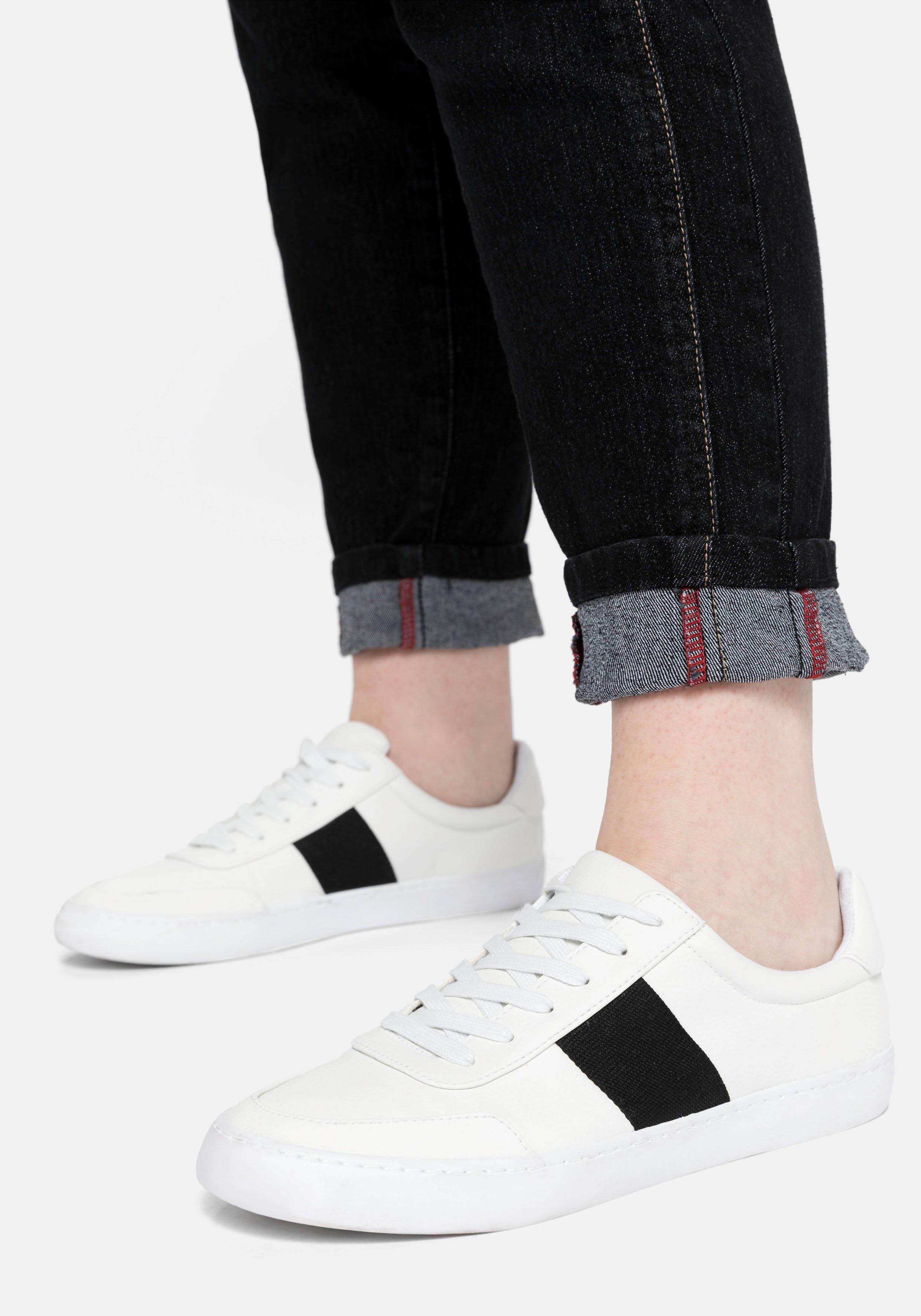 Slim Jeans mit vorverlegter Teilungsnaht
