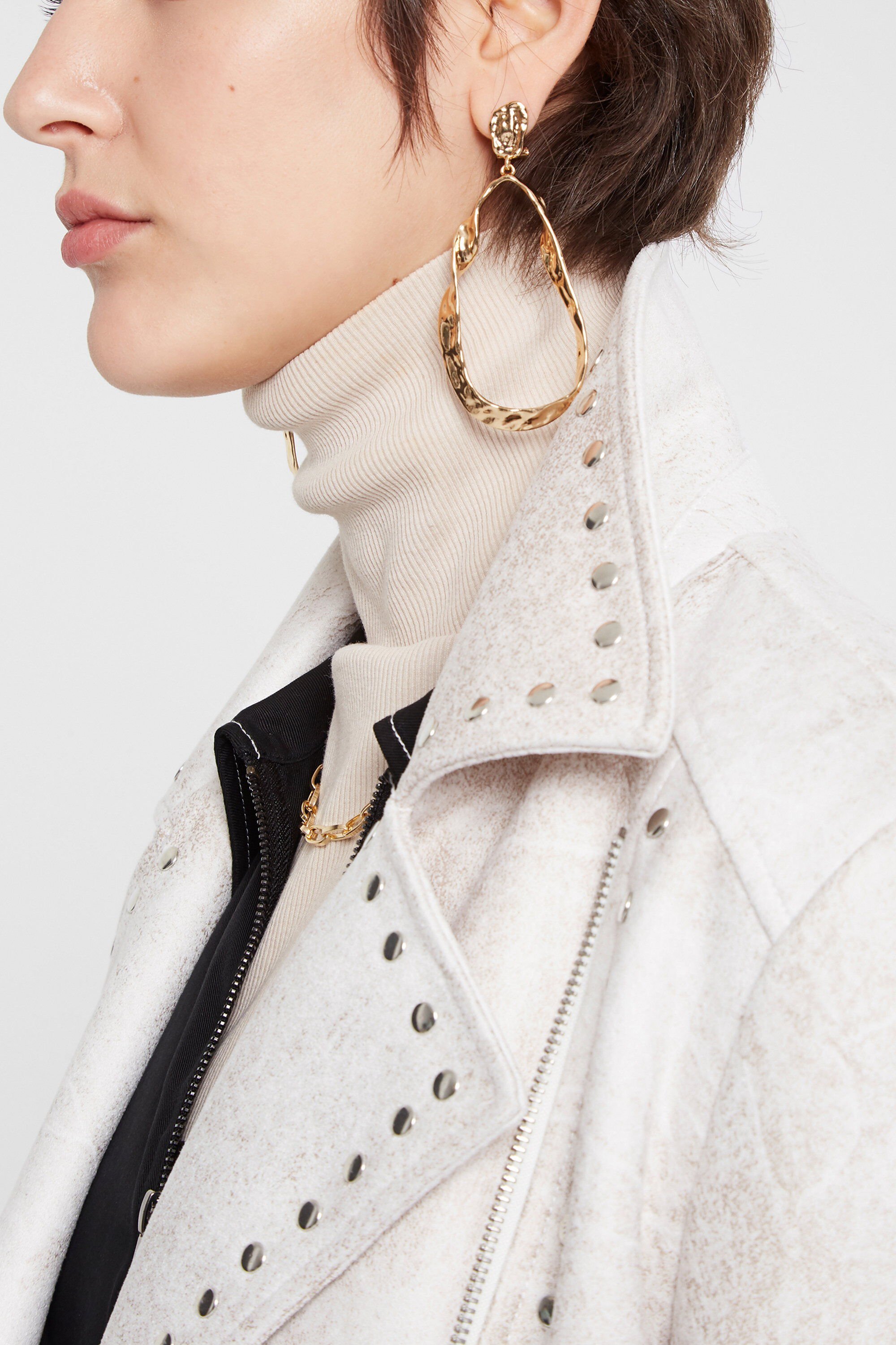 Veste motarde à franges et clous
