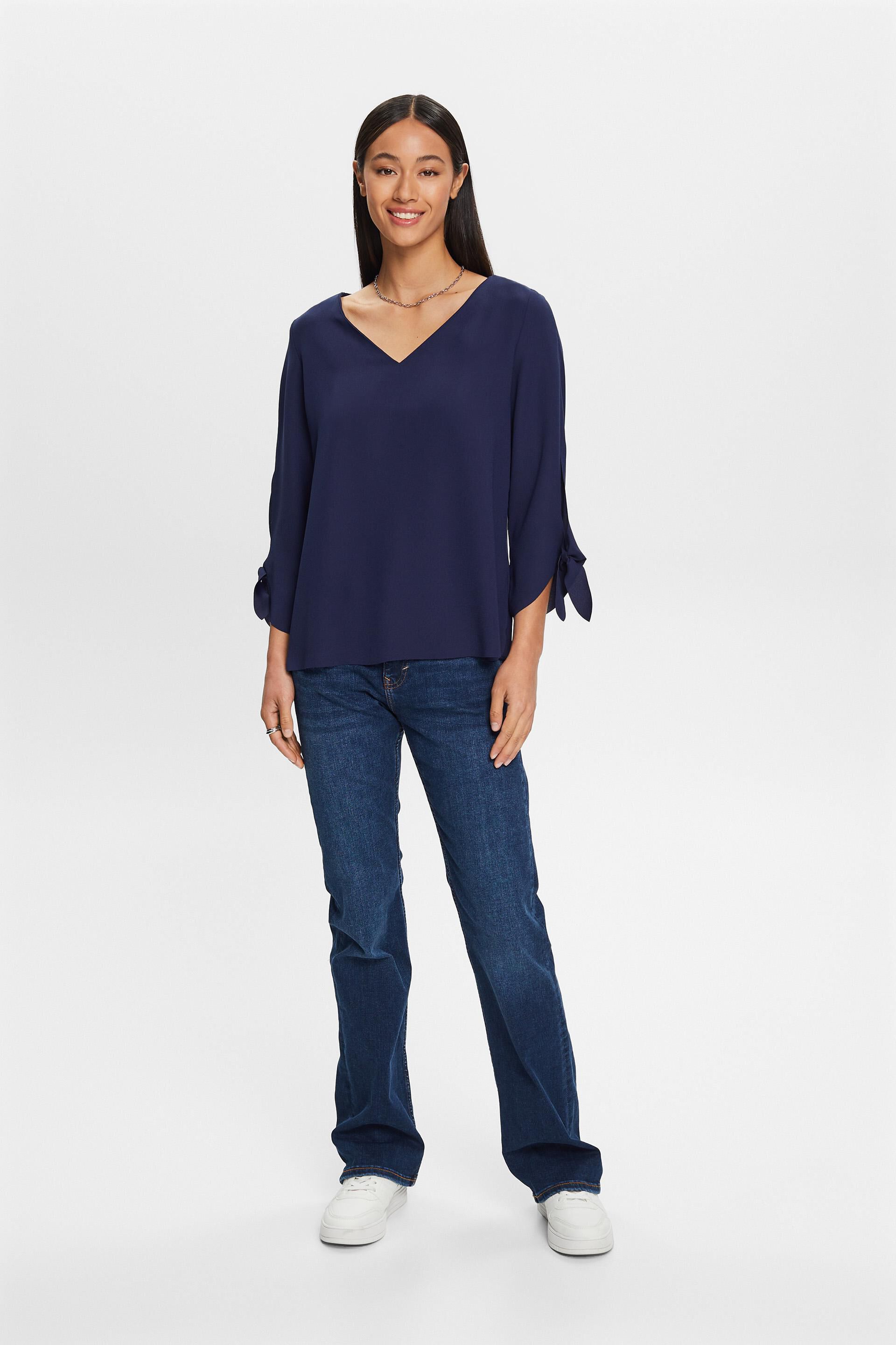 Blouse stretch à bords bruts
