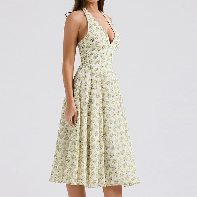 Puffields - Halter V-hals Diepuitgesneden Bloemenprint Open Rug Midi A-lijn Jurk