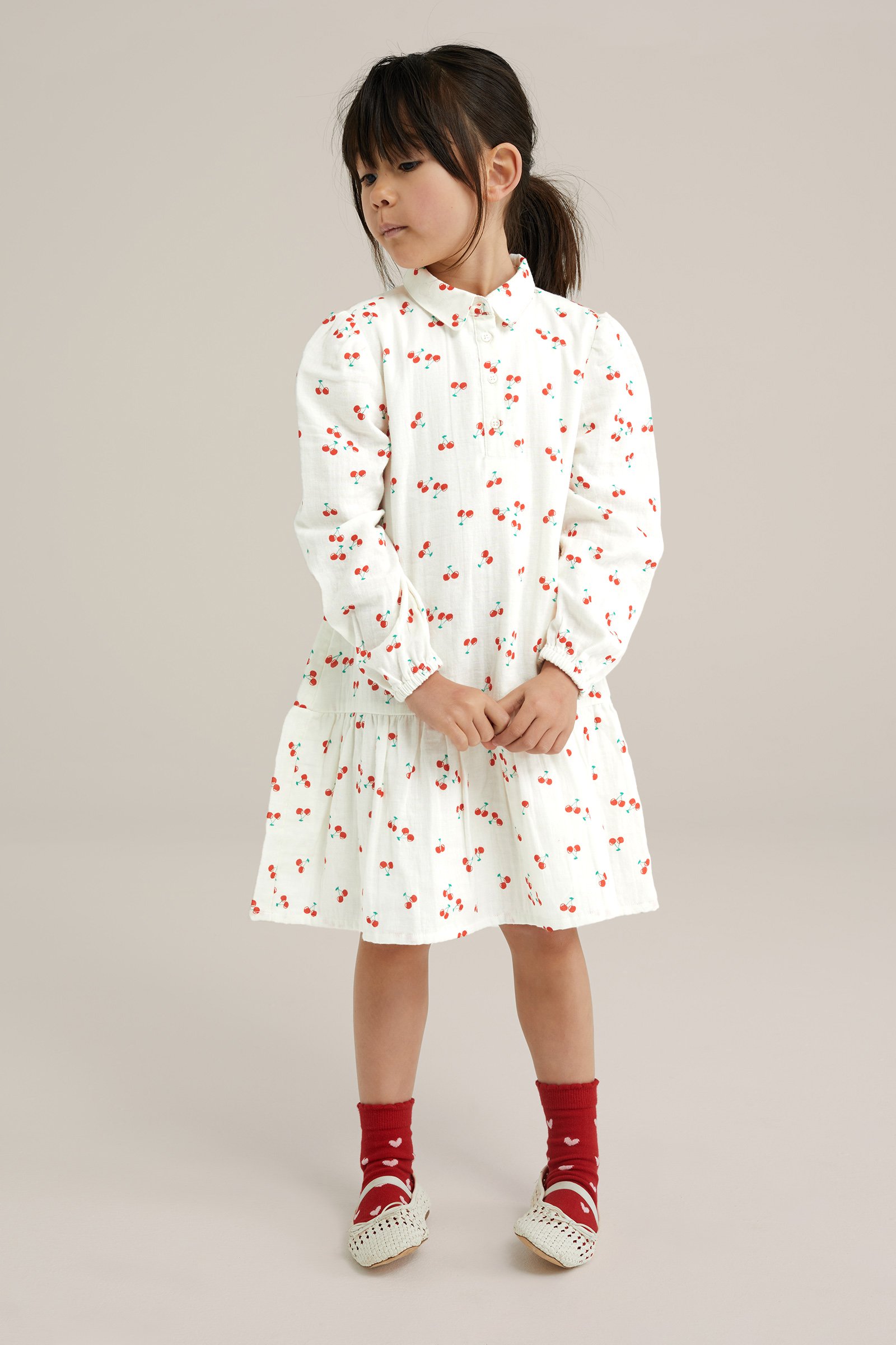 Meisjes jurk met dessin WE Fashion Gebroken wit