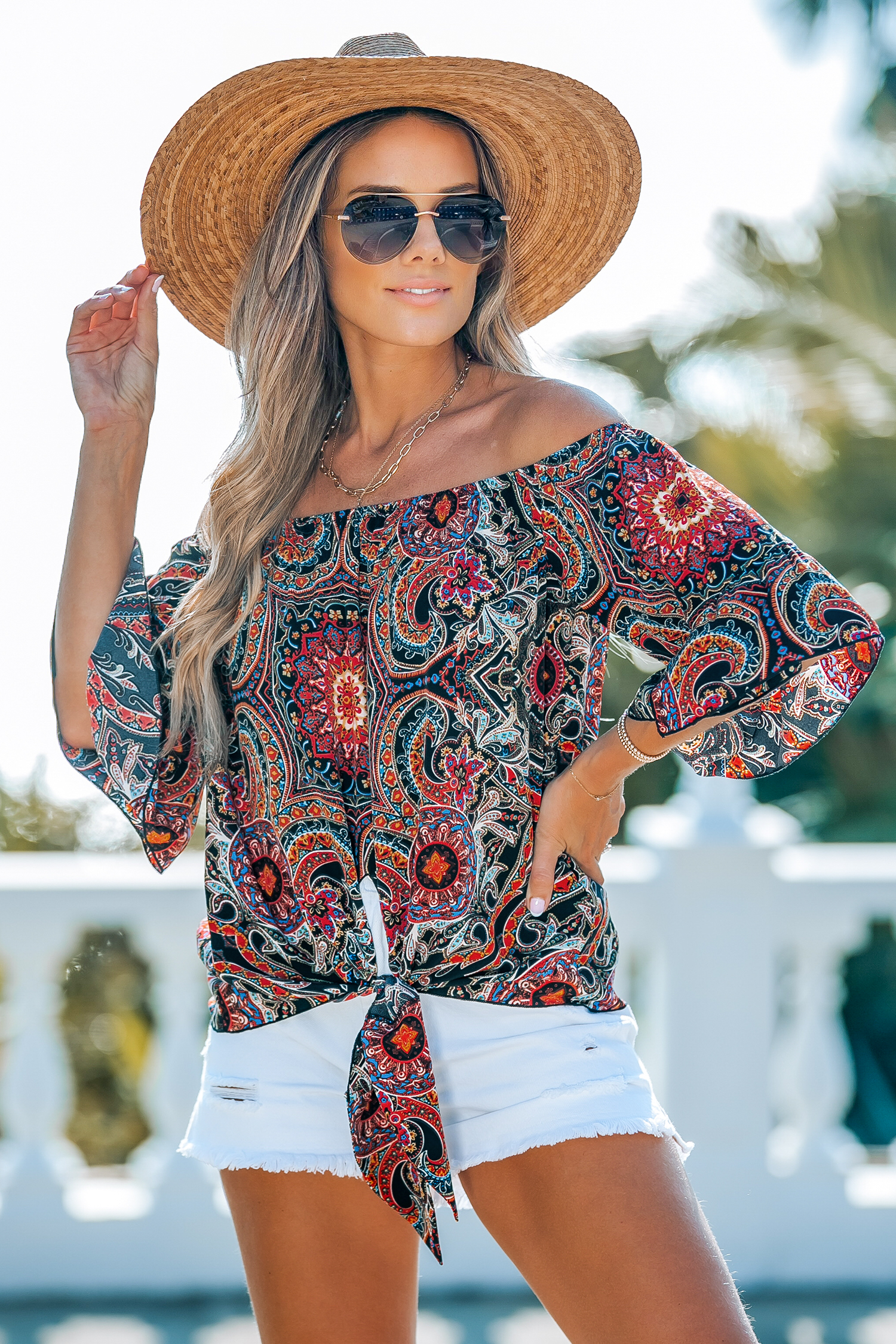 Blouse à épaules dénudées et volants boho