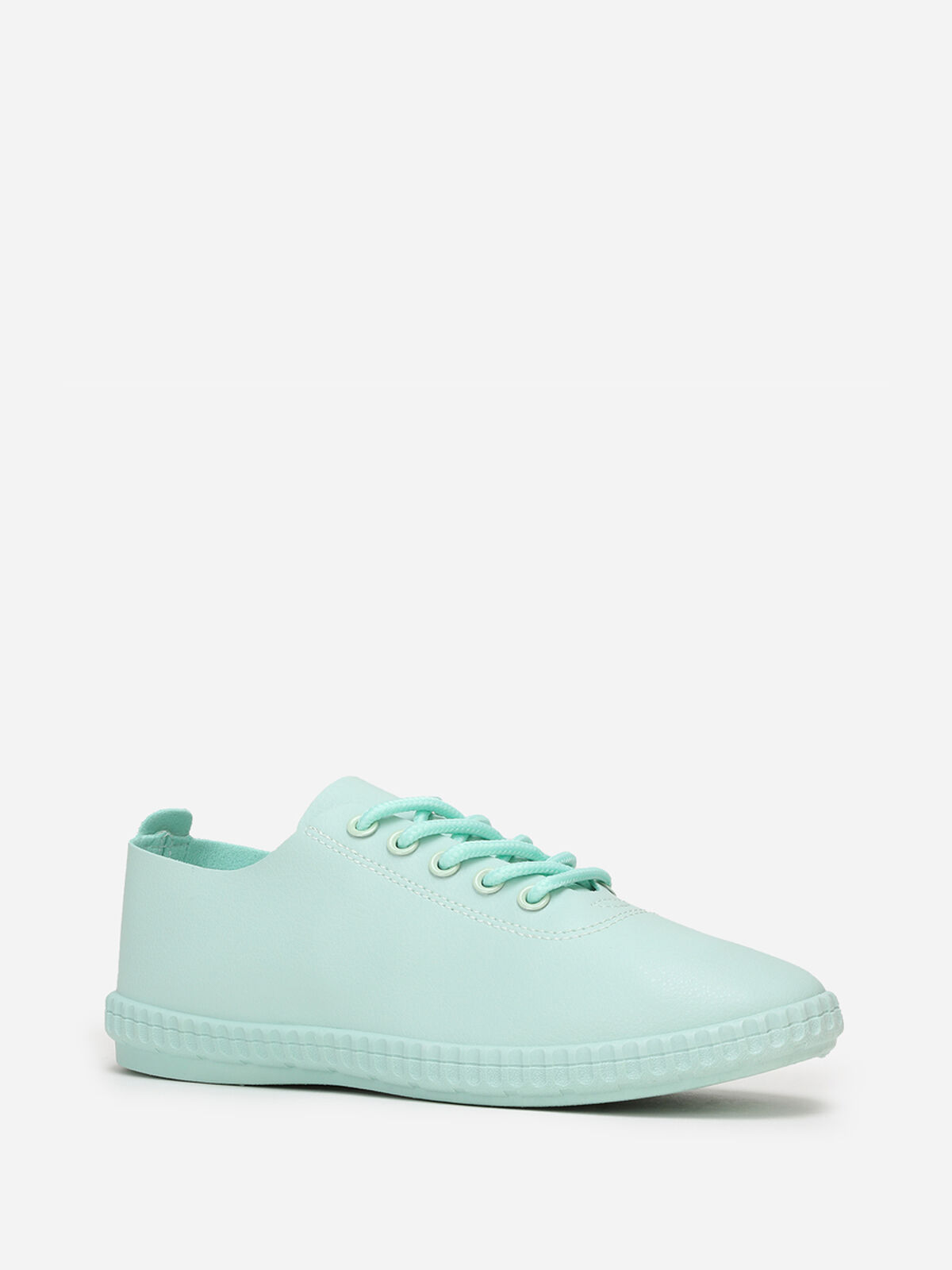 Tennis en simili avec semelle en relief- Vert clair