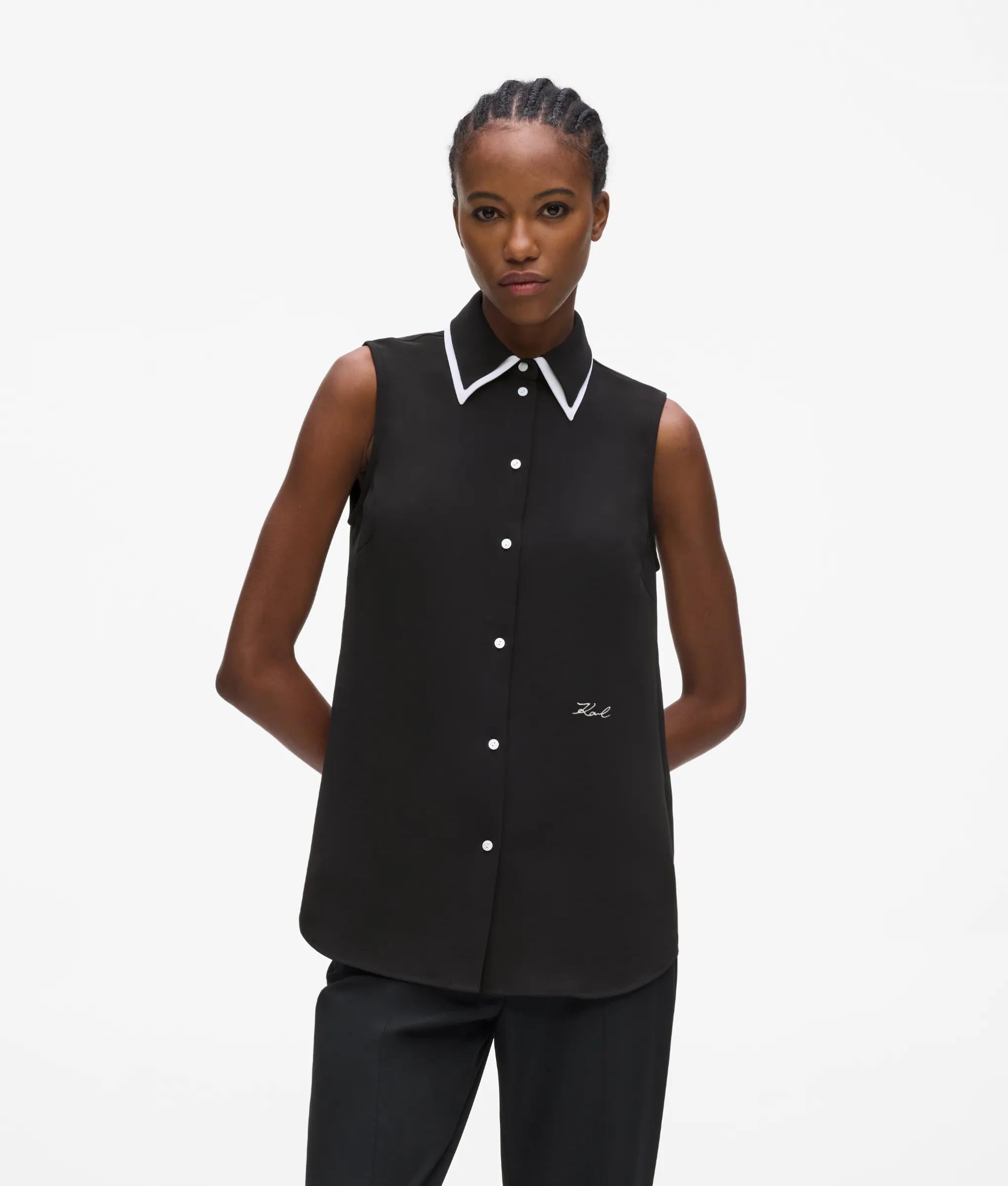Zwart-witte mouwloze blouse