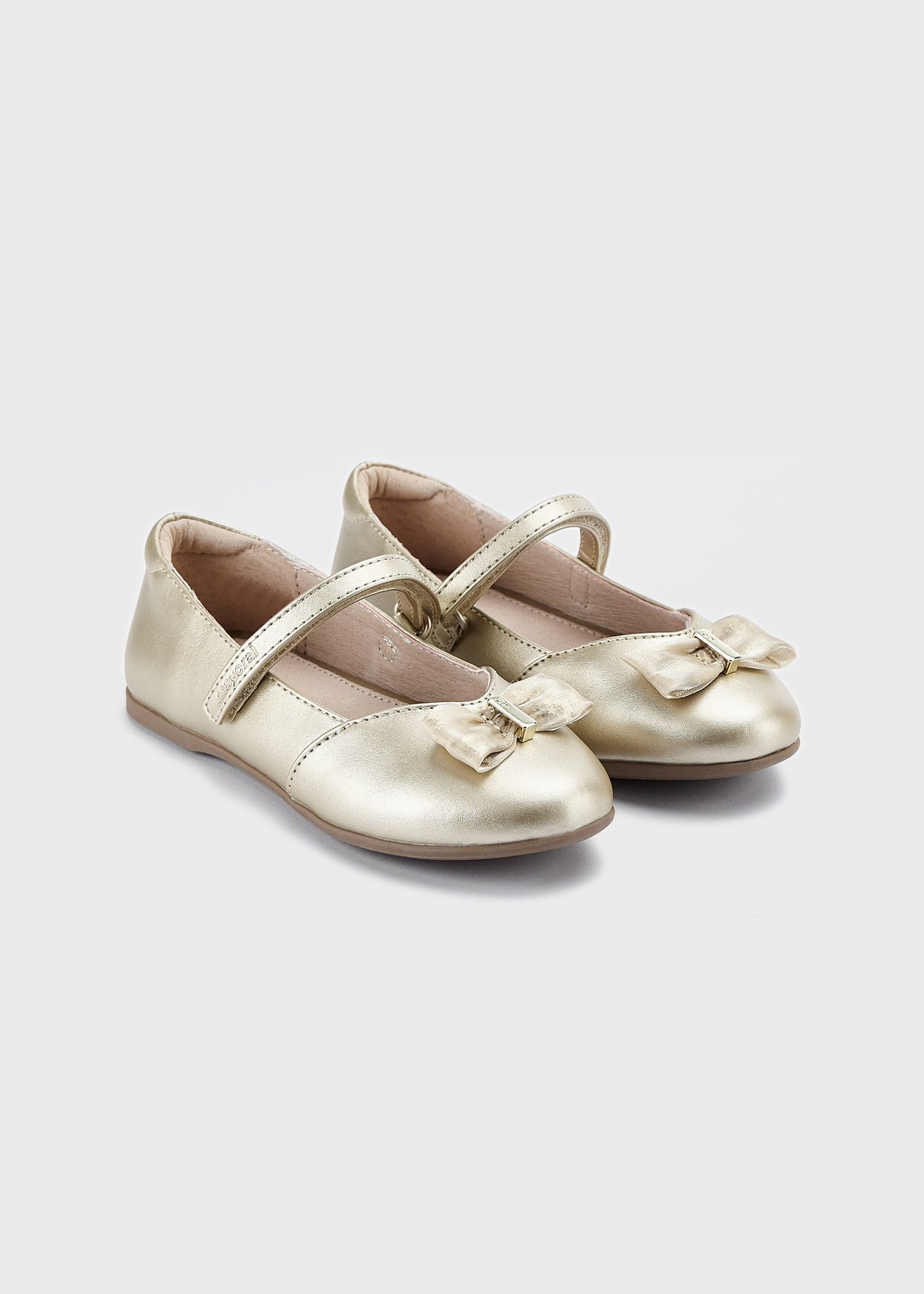 Sapato estilo Mary Jane com palmilha com laço, em couro sustentável, para meninas.