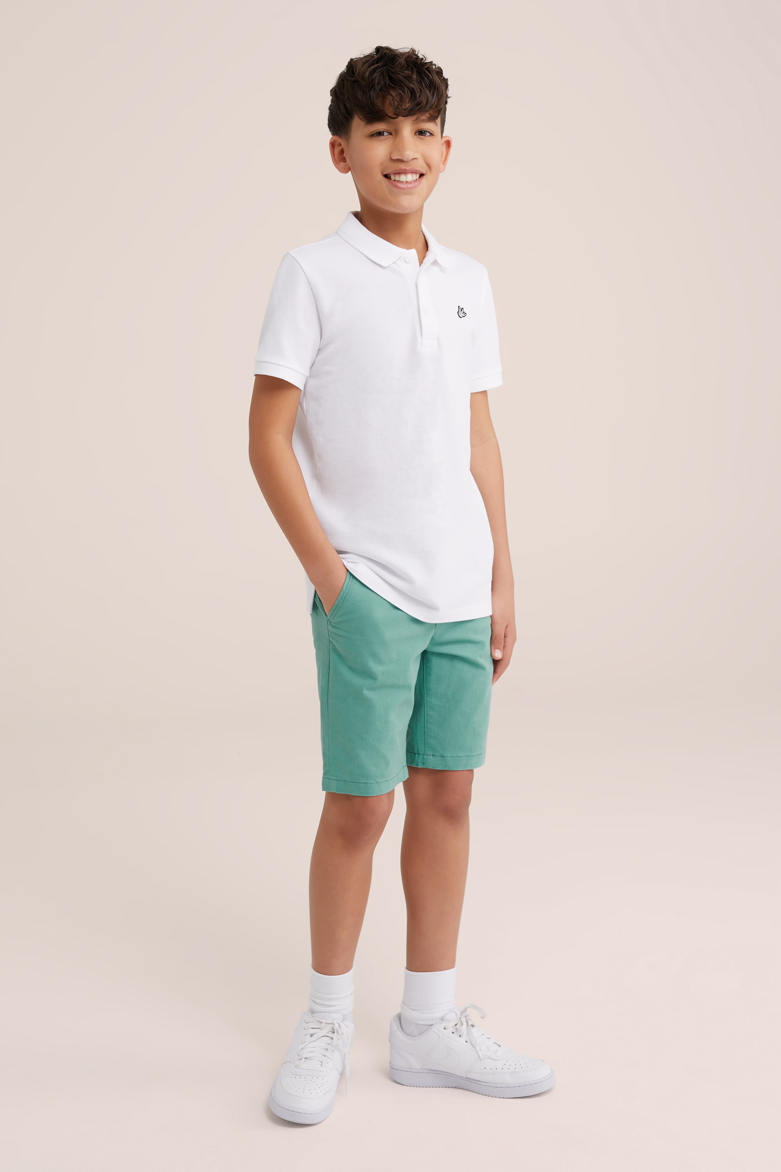 Jongens slim fit chinoshort met dessin WE Fashion Mintgroen