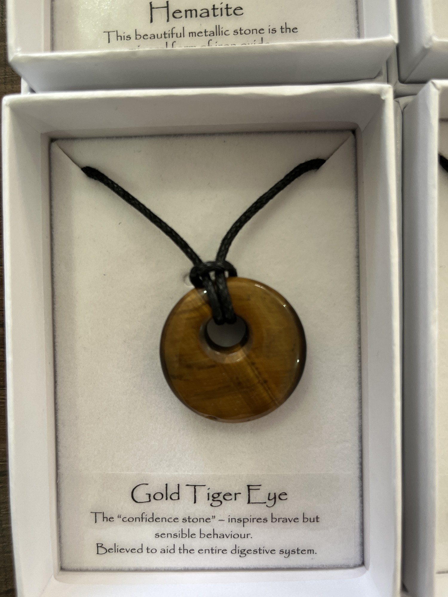 Edelsteinkette Tigerauge oder Hematit, diverse Formen, Ø 2,5 - 3 cm, L 38 cm günstig bestellen