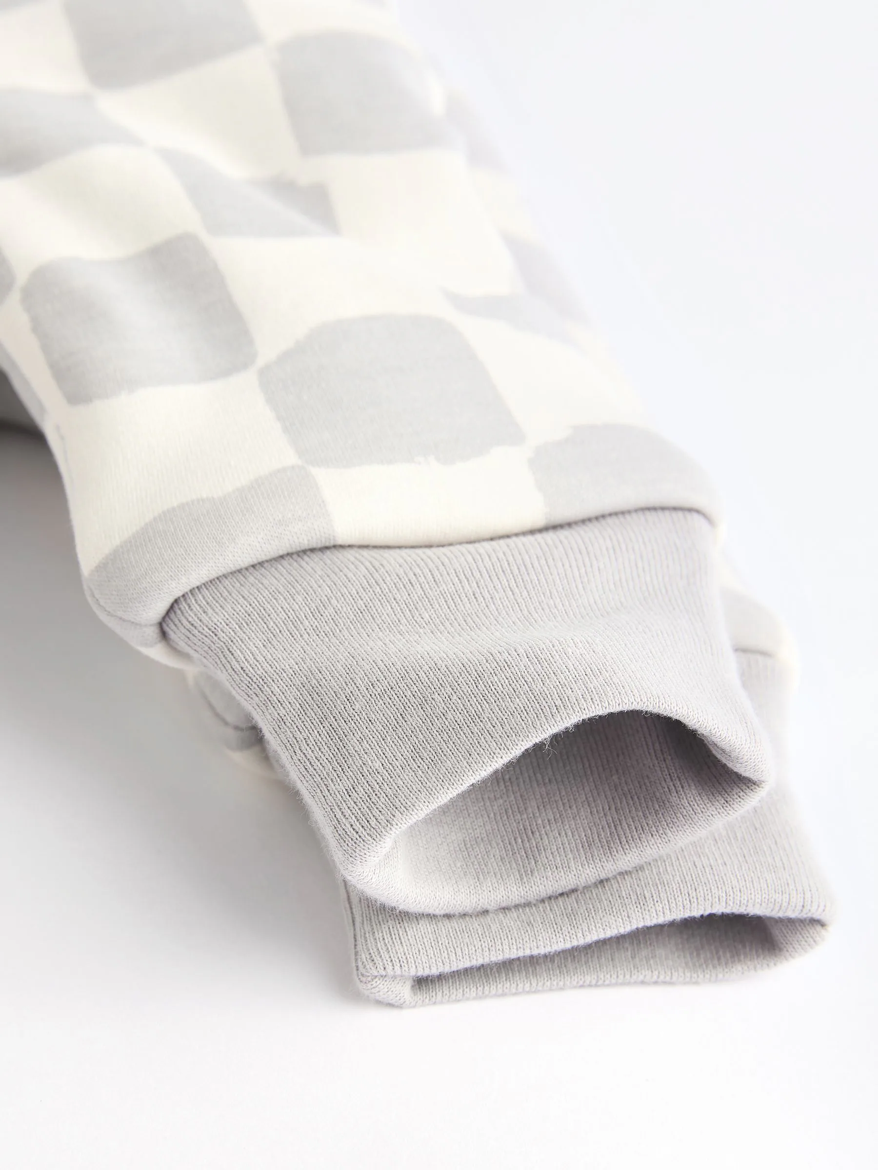 Grijs dambordpatroon - 2.5 TOG gewatteerde babypyjama
