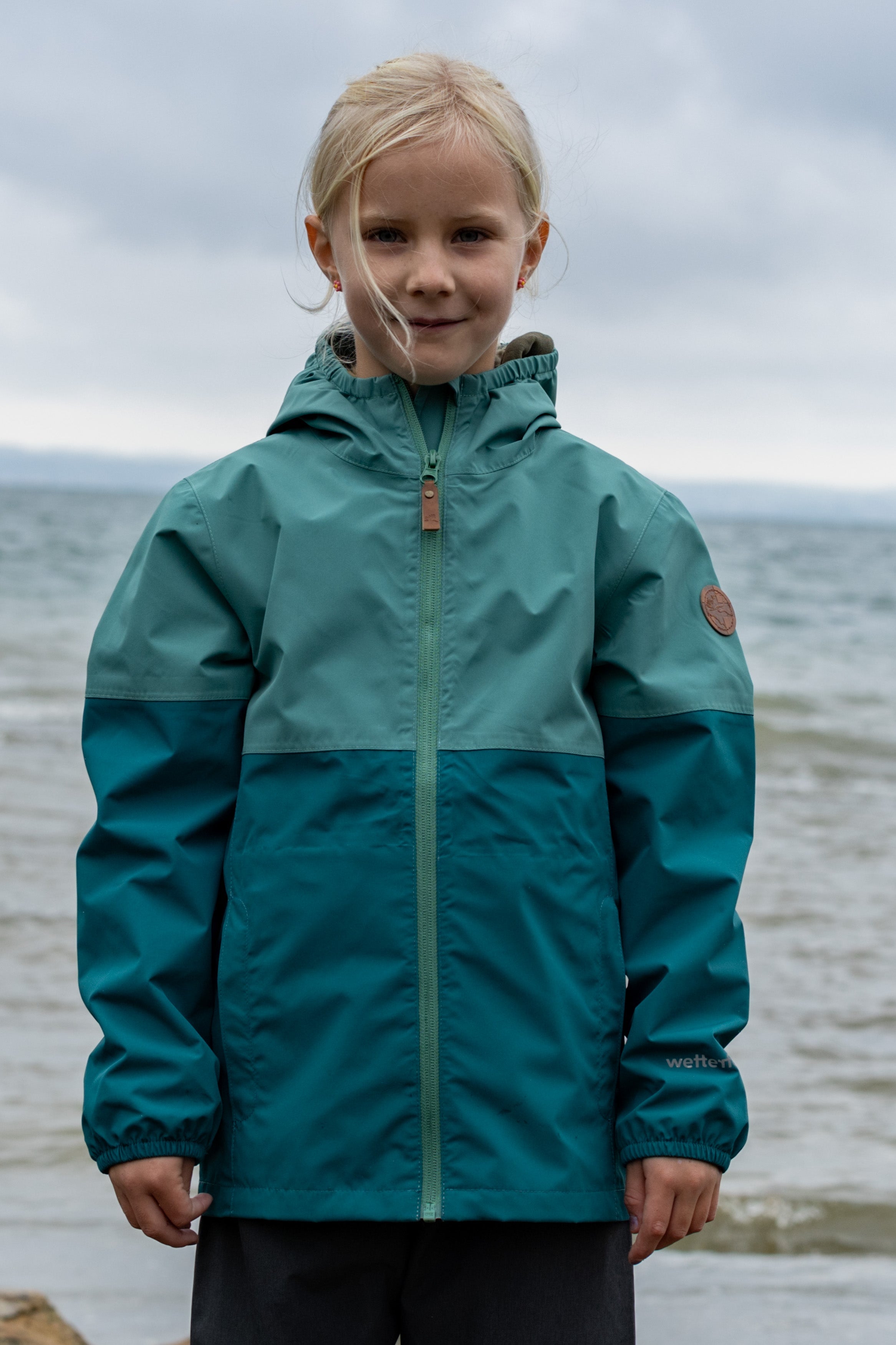 Kinder Regenjacke Travellight deep sea