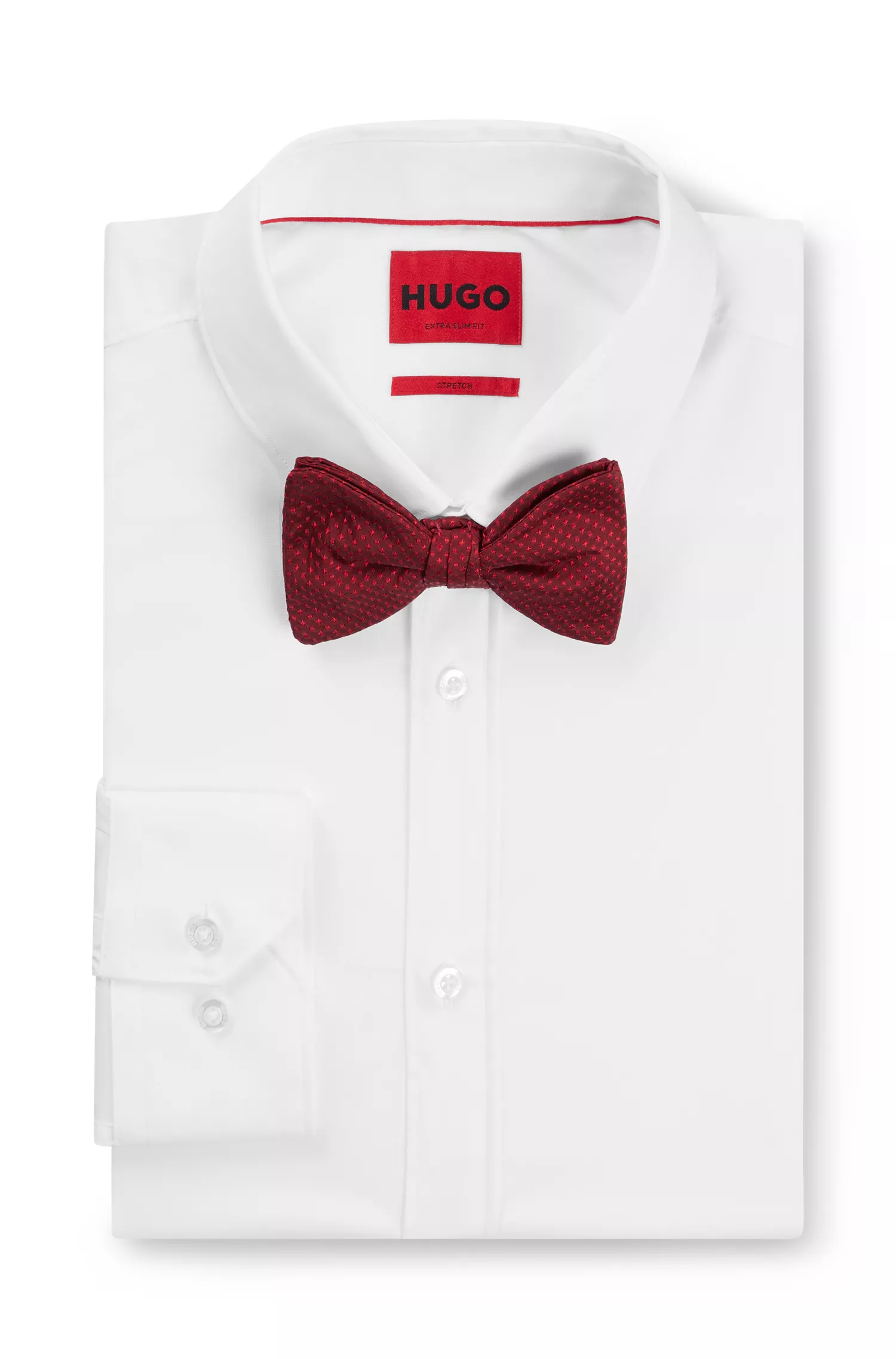 Gravata borboleta HUGO com estampa de bolinhas vermelhas em jacquard de seda.