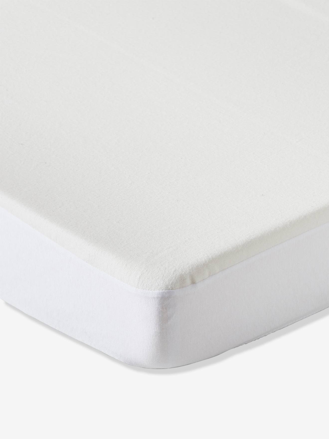 Capa protetora de pelúcia, feita de algodão orgânico branco.