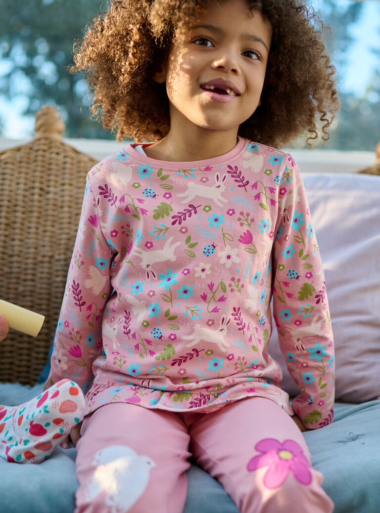 Pyjama rose en côtes imprimé fantaisie pour fille
