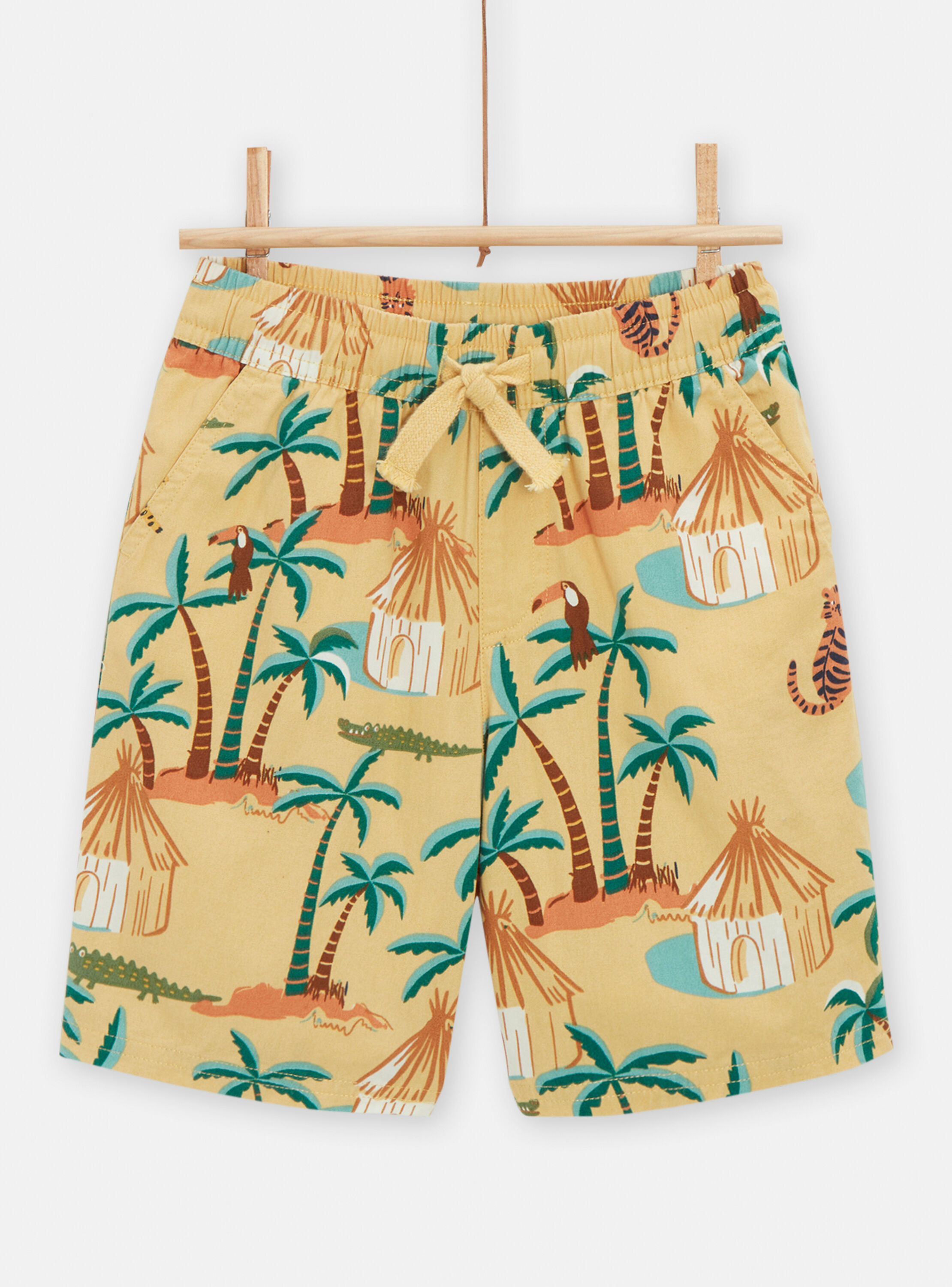 Boy's pale yellow Bermuda shorts with savannah print