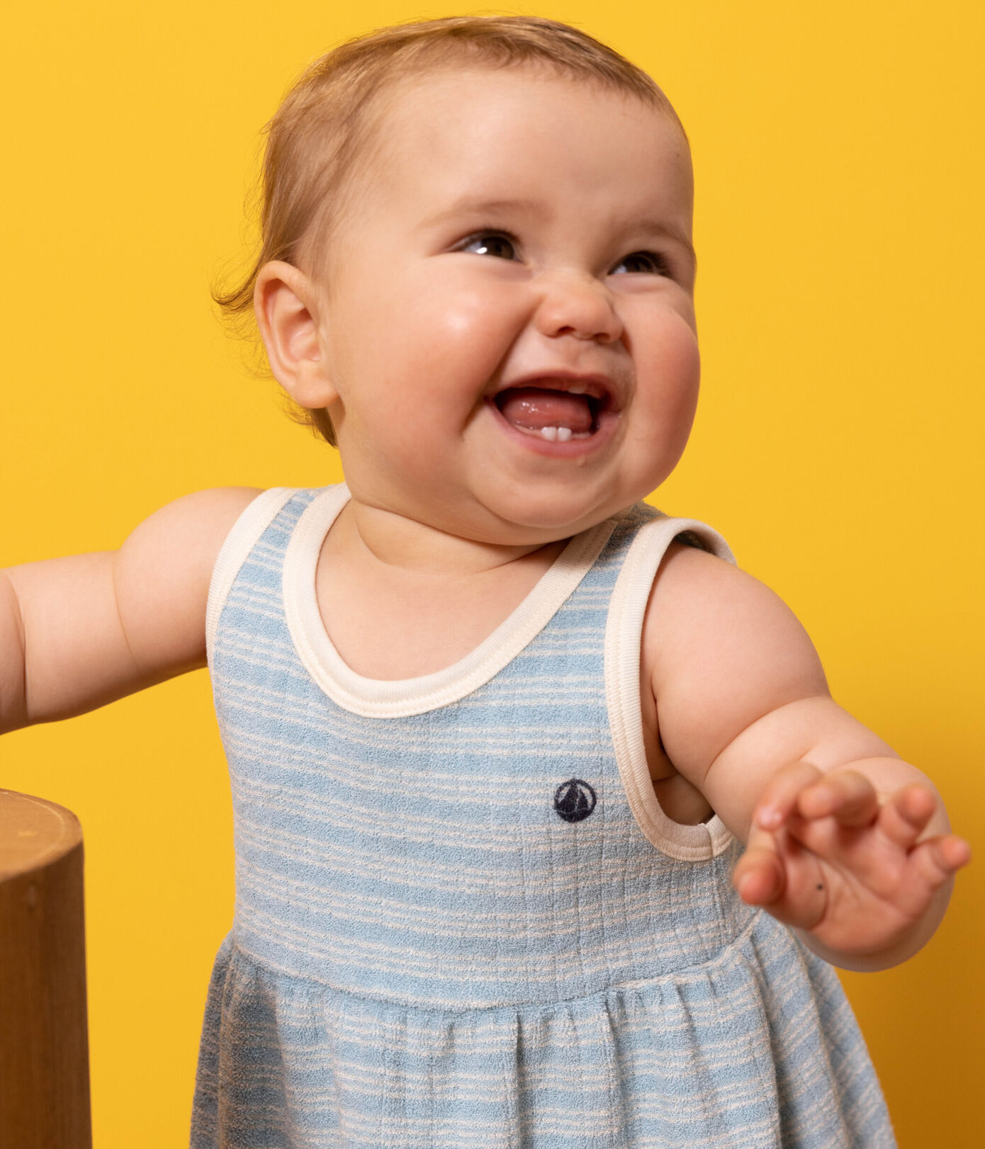 Robe sans manche bébé en bouclette éponge rayée