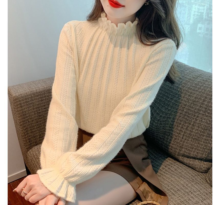 Essere - Blouse met pofmouwen, hoge hals en uitlopende manchetten van kant