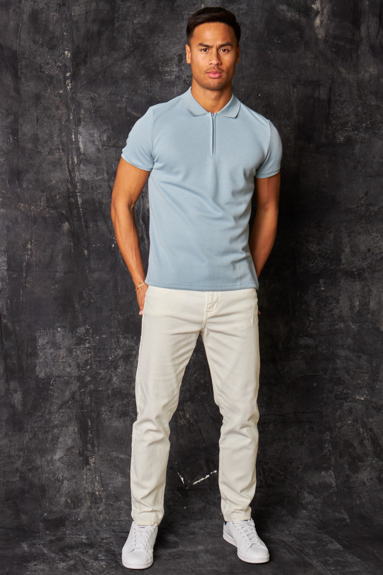 Polo manches courtes à col zippé bleu clair