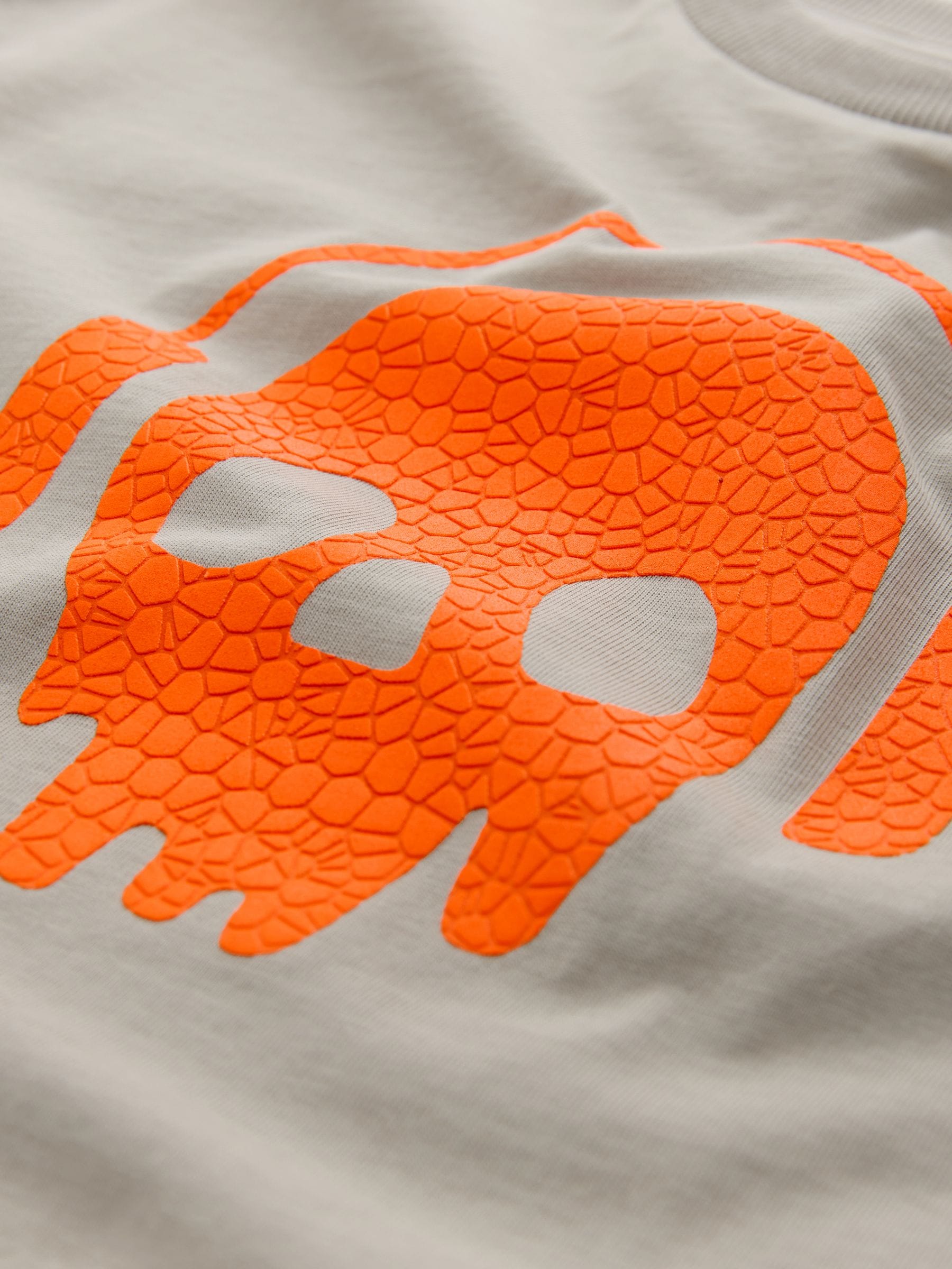 Kiezelkleurig/oranje schedel - Ruimvallend T-shirt met print en korte mouwen (3-16 jr)