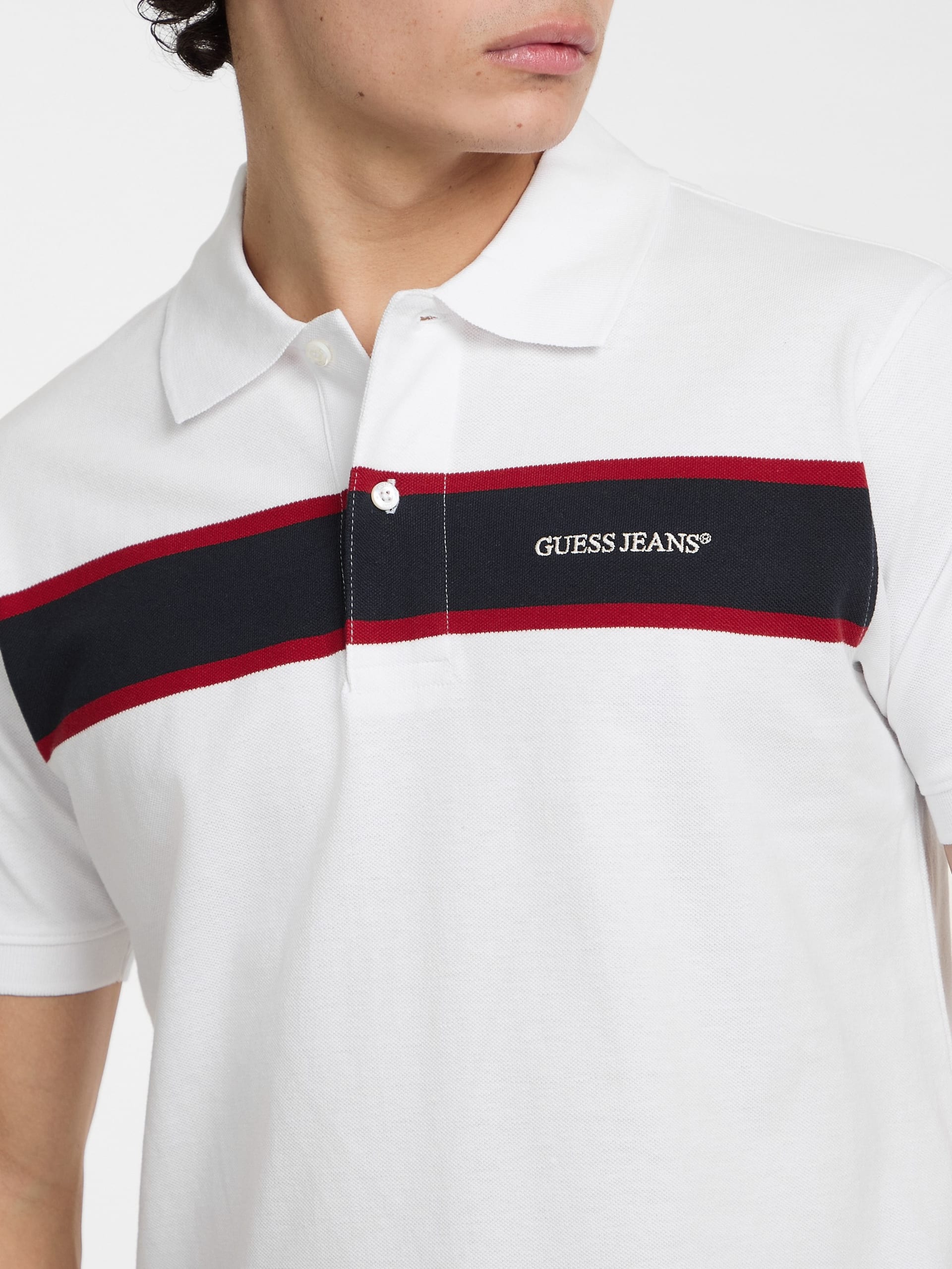 Polo listrada em piqué