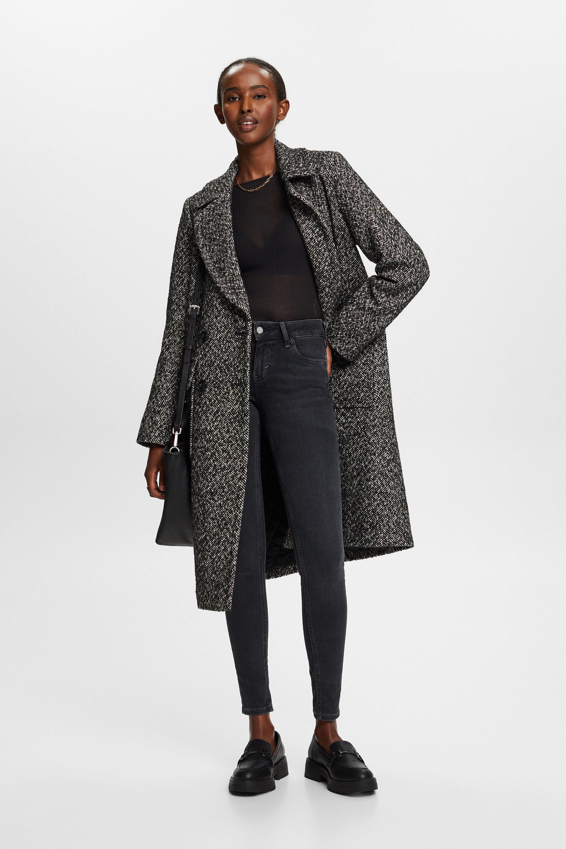 En matière recyclée : jean stretch de coupe Skinny Fit taille mi-haute