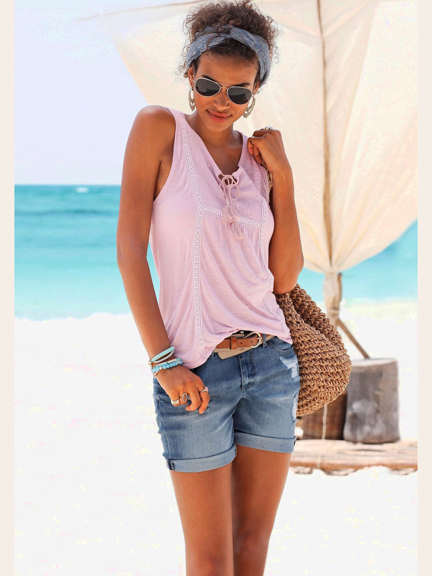 Bermuda en jean aspect usé, aspect légèrement déchiré