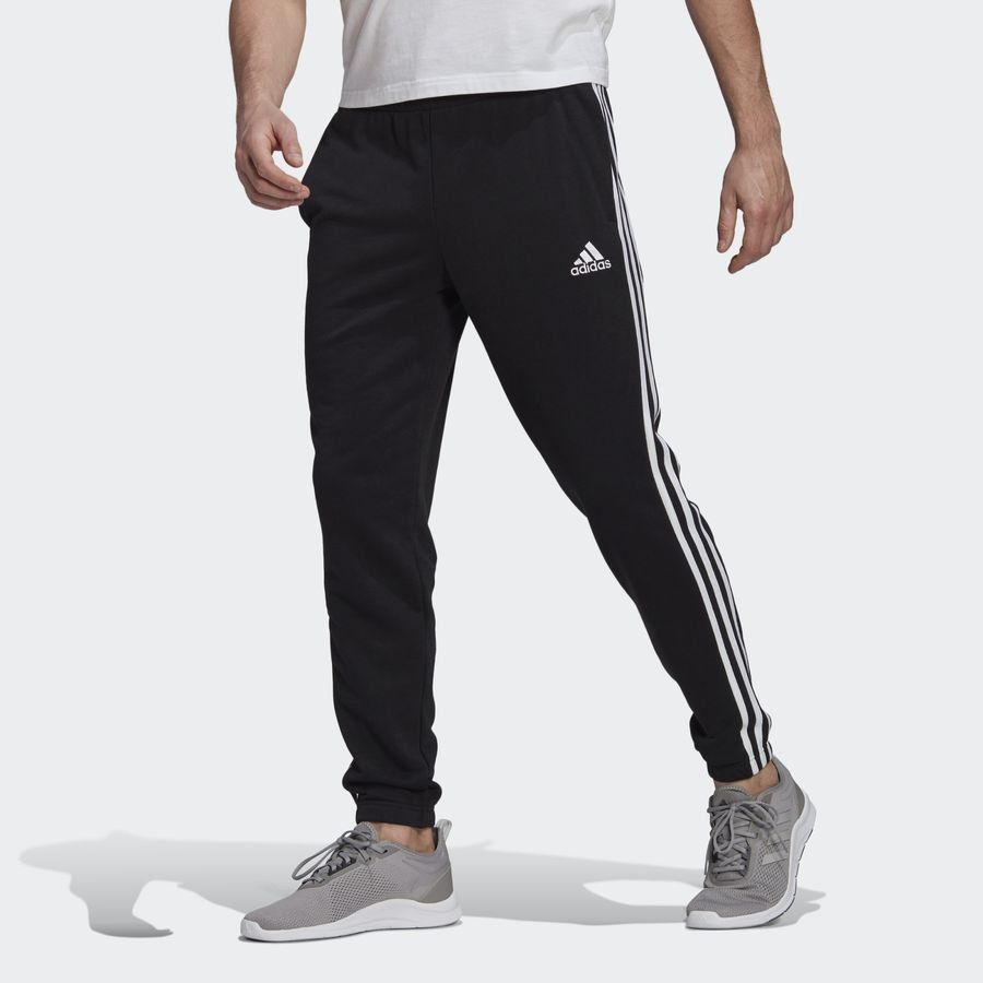 adidas Bas de Survêtement Essentials French Terry Tapered 3-Stripes - Noir/Blanc