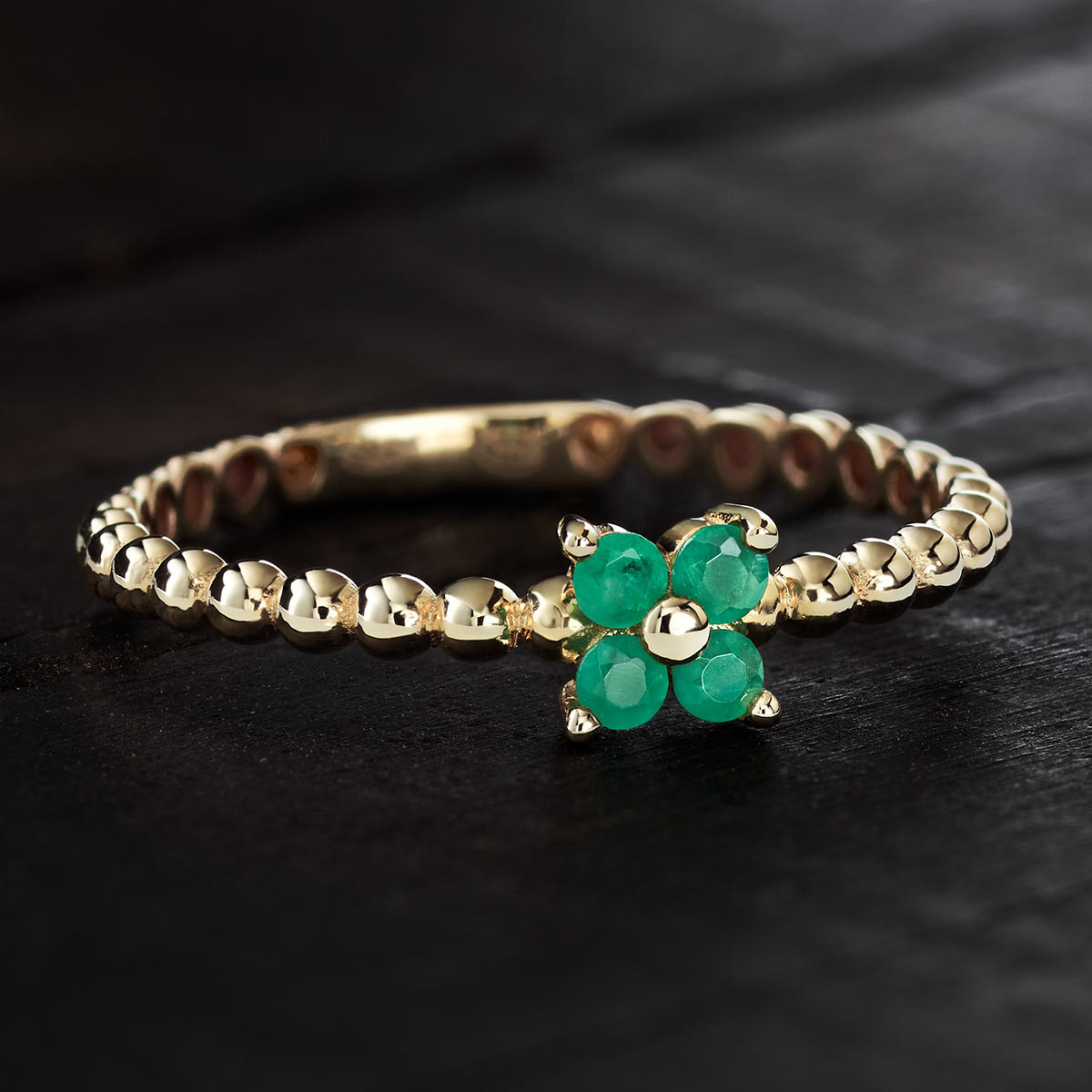 Bague or 375 jaune emeraudes