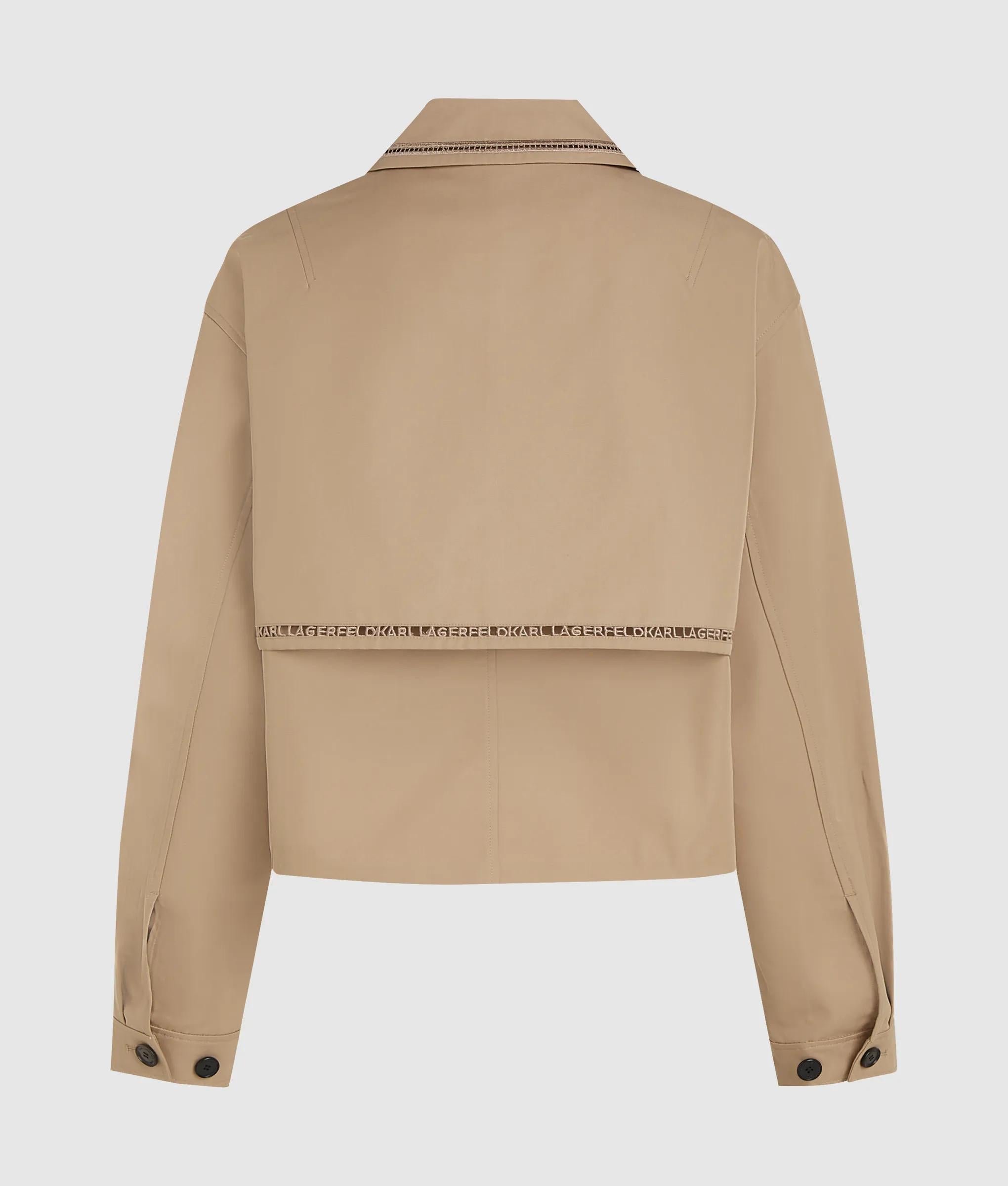 Korte trench jas met uitgesneden borduursel