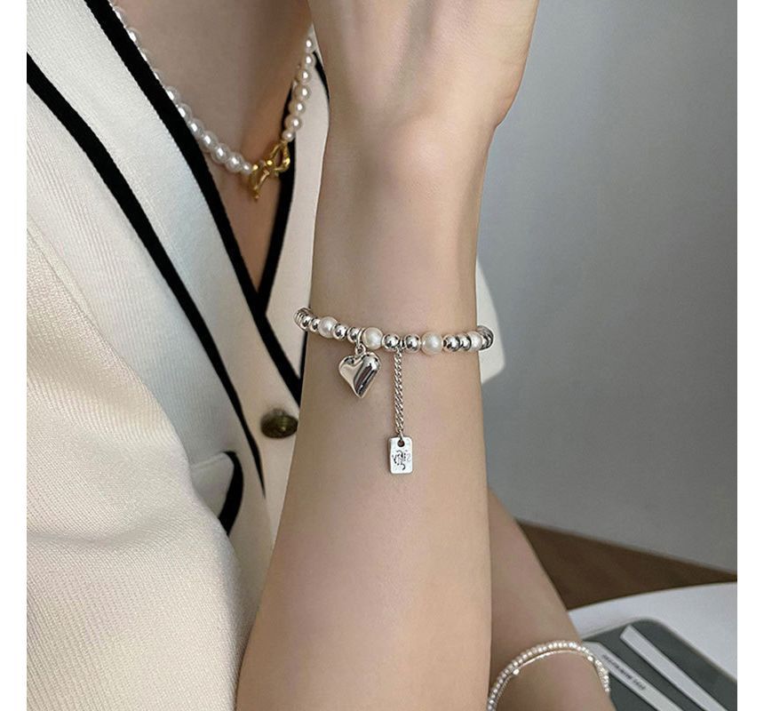Catharsis - Hartvormige armband van imitatieparels