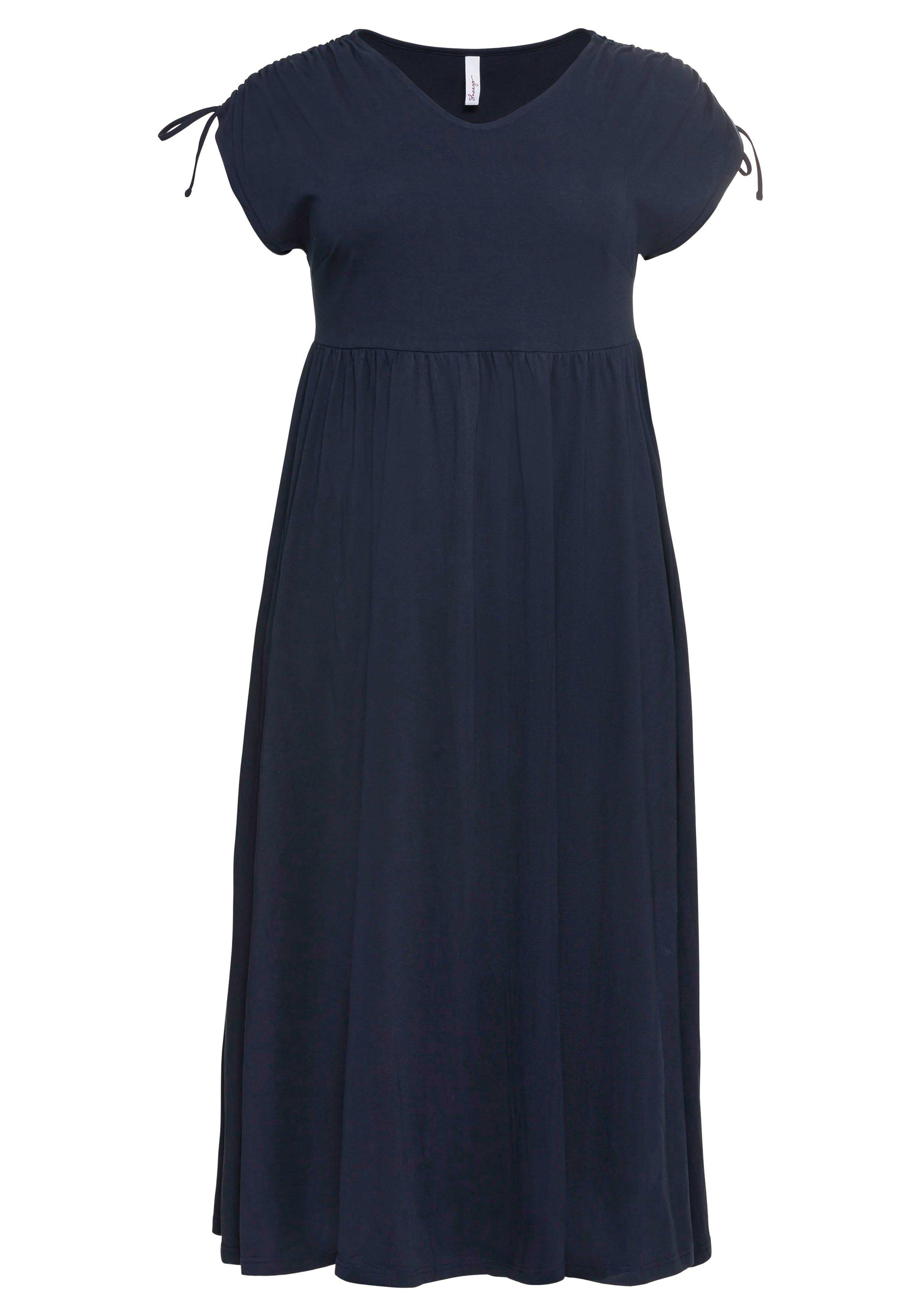 Jerseykleid mit weitem Rock und V-Ausschnitt