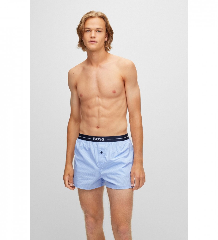 Conjunto de 2 shorts de pijama BOSS com logo, cós azul e listras azuis.