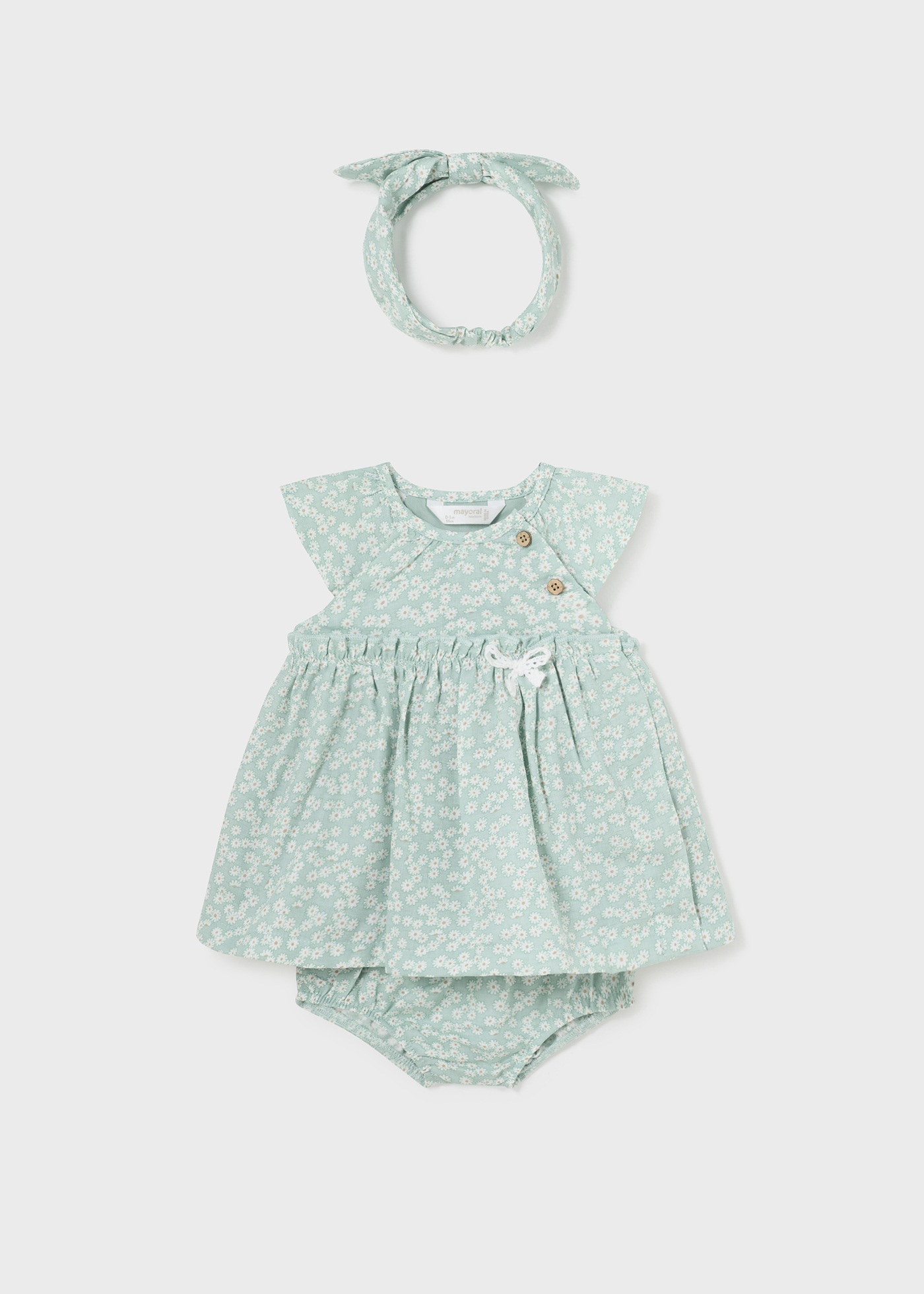 Vestido Jade para recém-nascido da Better Cotton com capa de fralda e faixa de cabelo.