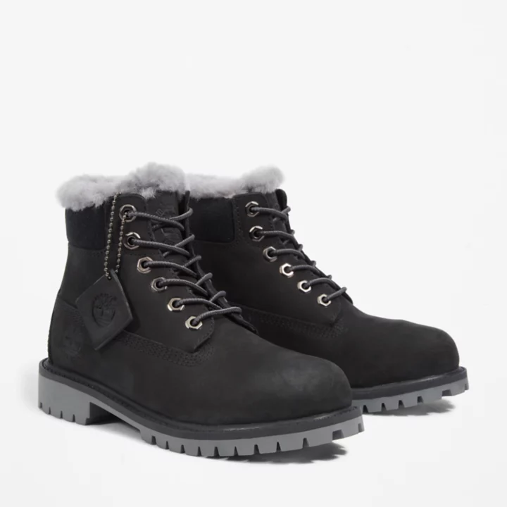 Bota de inverno Timberland Premium de 6 polegadas para jovens, na cor preta.