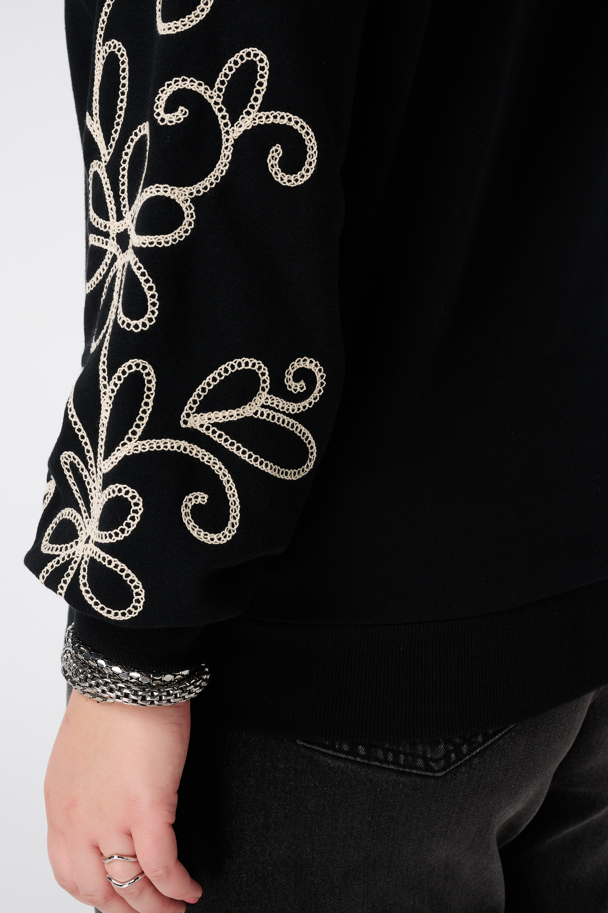 Sweater met broderie details Zwart