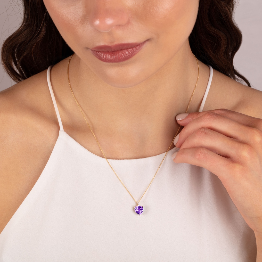 Anhänger 750/18 K Gelbgold Herz mit Amethyst und Diamanten 0.01 ct H/si