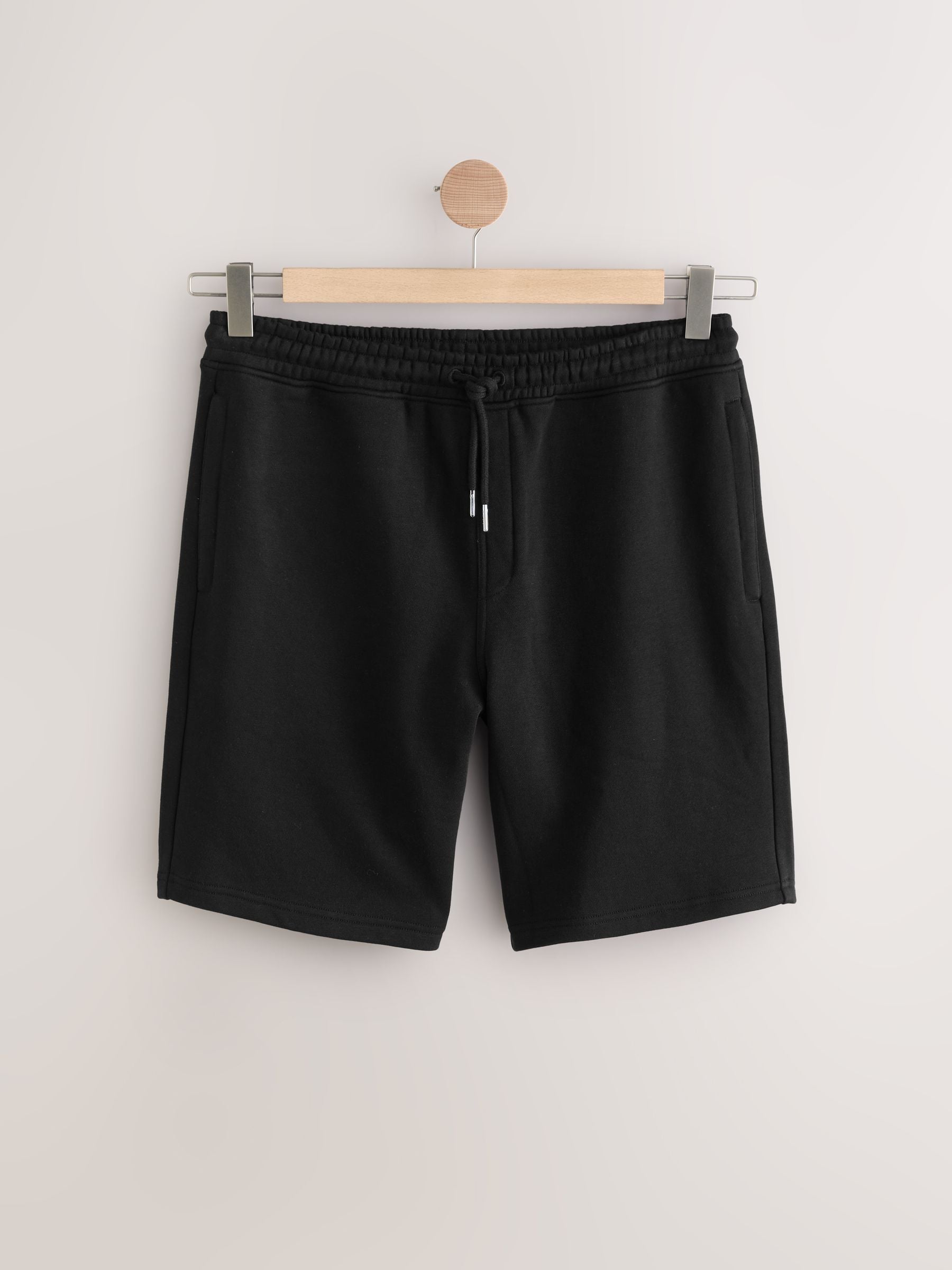 Zwart - Geborstelde jersey shorts met ritszakken